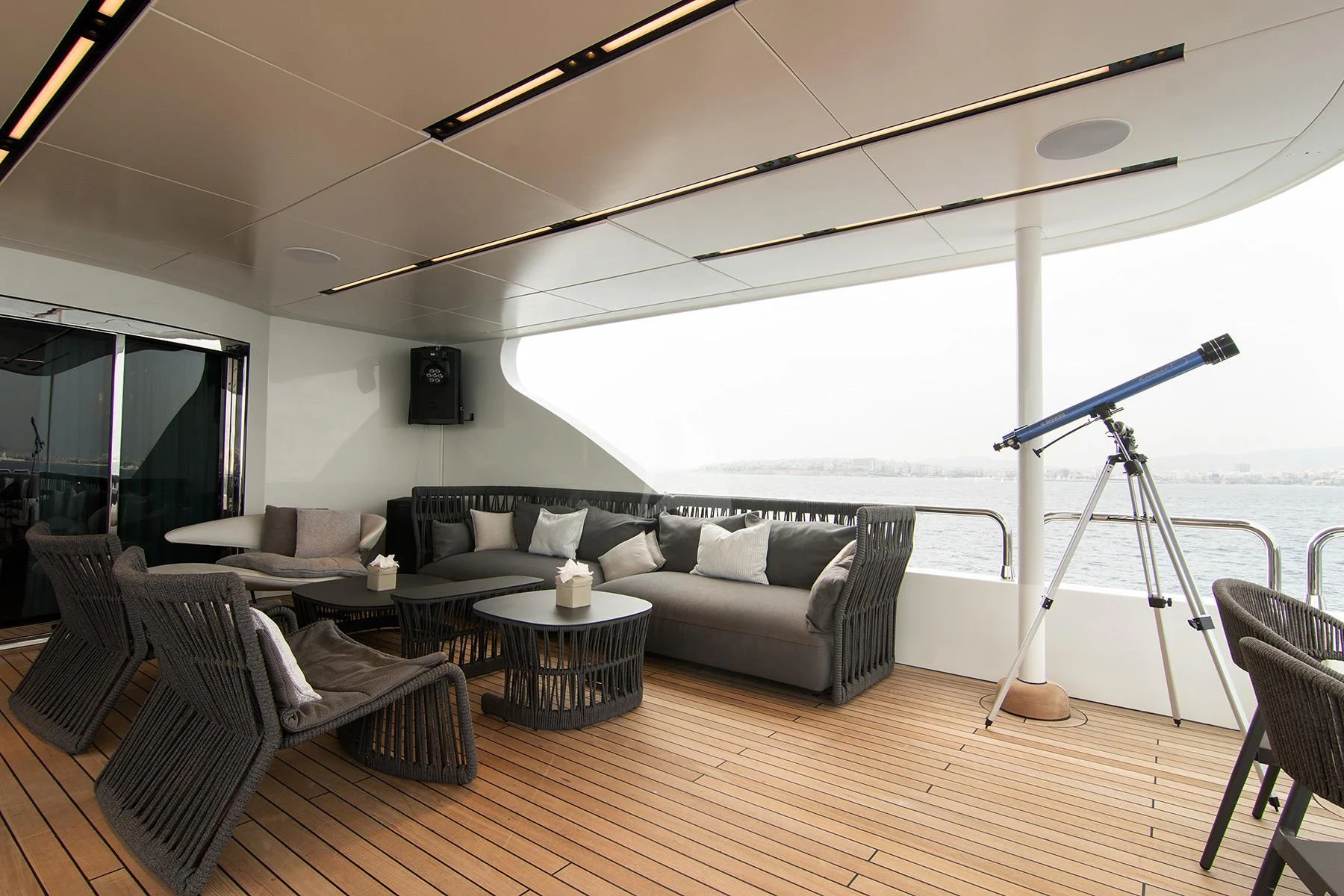 a living room with a large window aboard HALLO Yacht for Sale