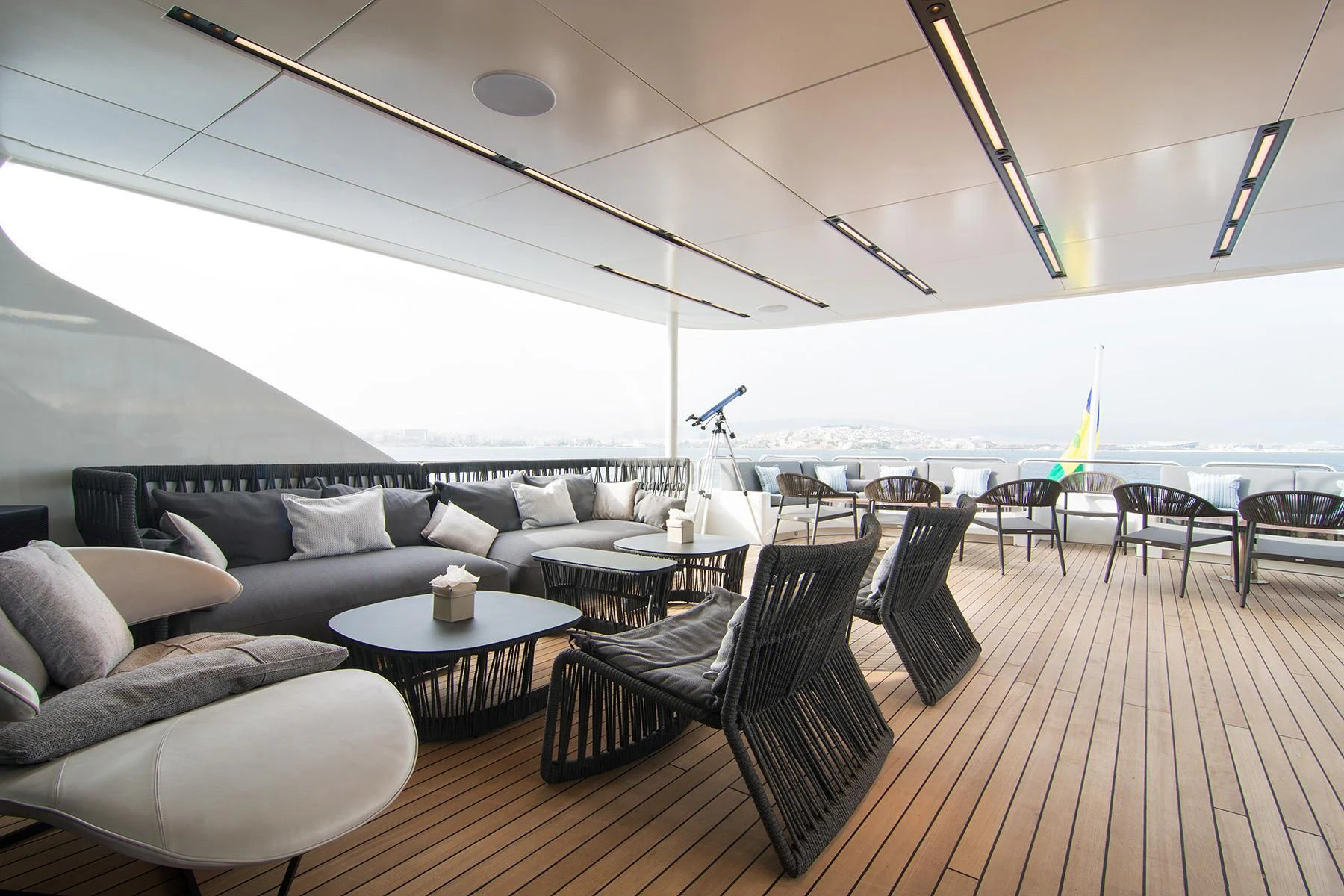 a living room with a large patio aboard HALLO Yacht for Sale