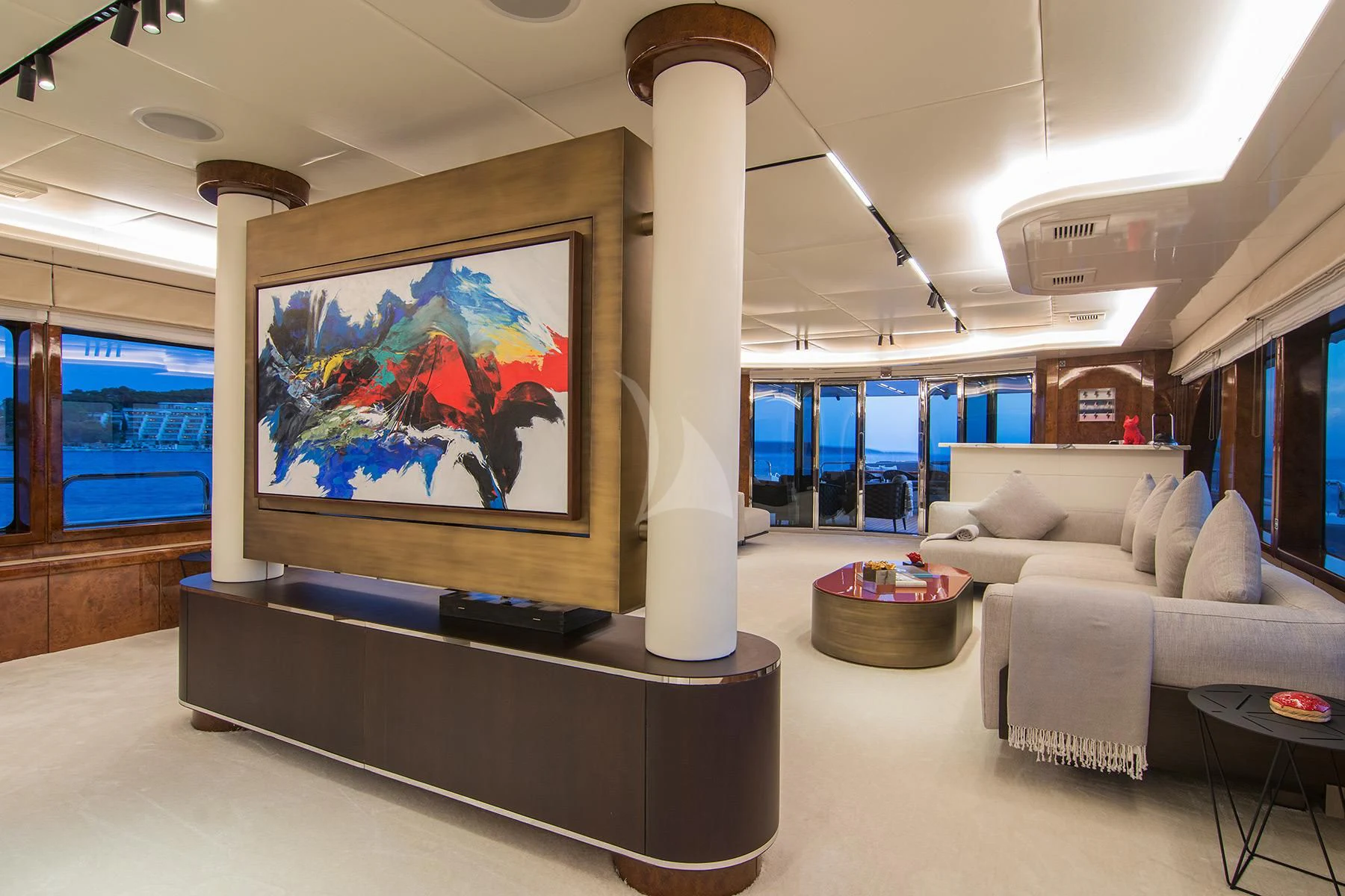 a large room with a large screen aboard HALLO Yacht for Sale