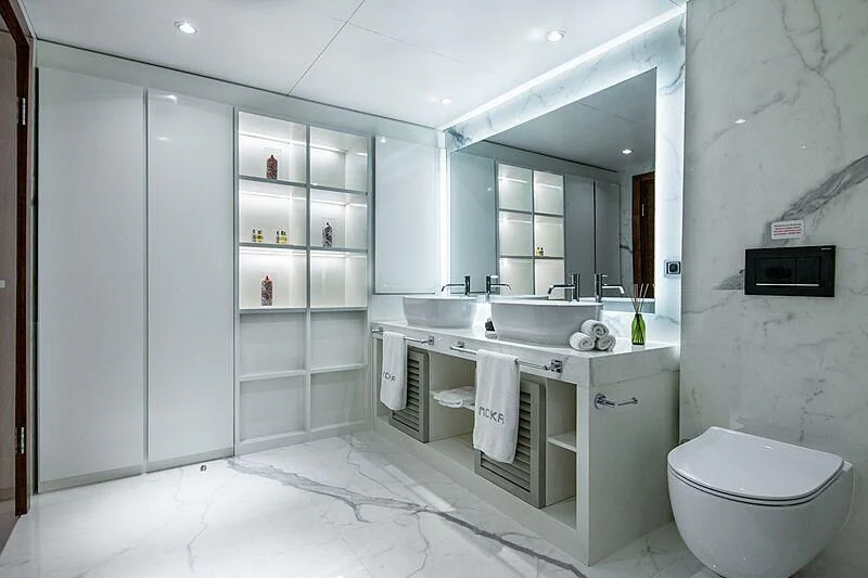 a bathroom with a sink and a toilet aboard HALLO Yacht for Sale