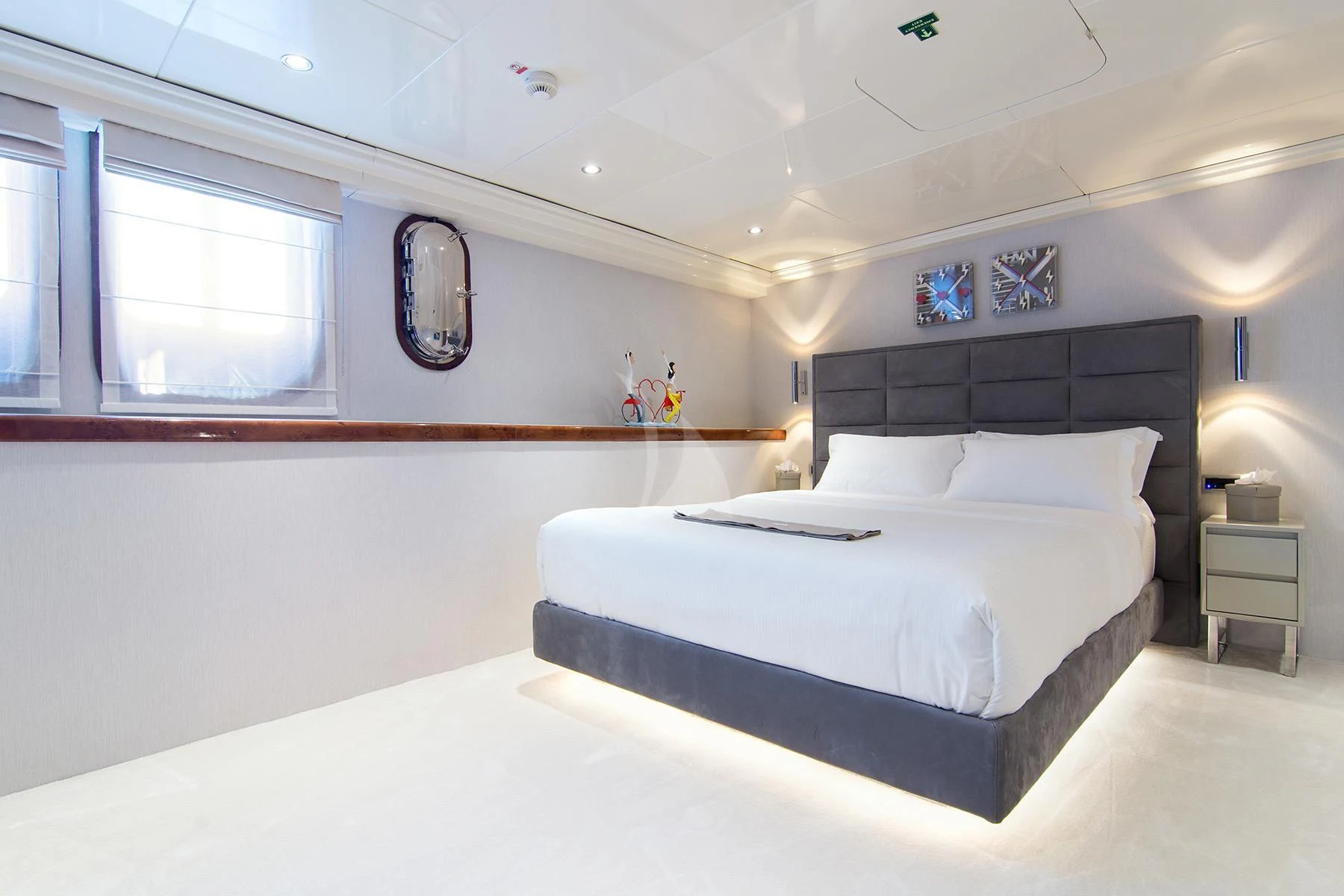 a bedroom with a bed aboard HALLO Yacht for Sale