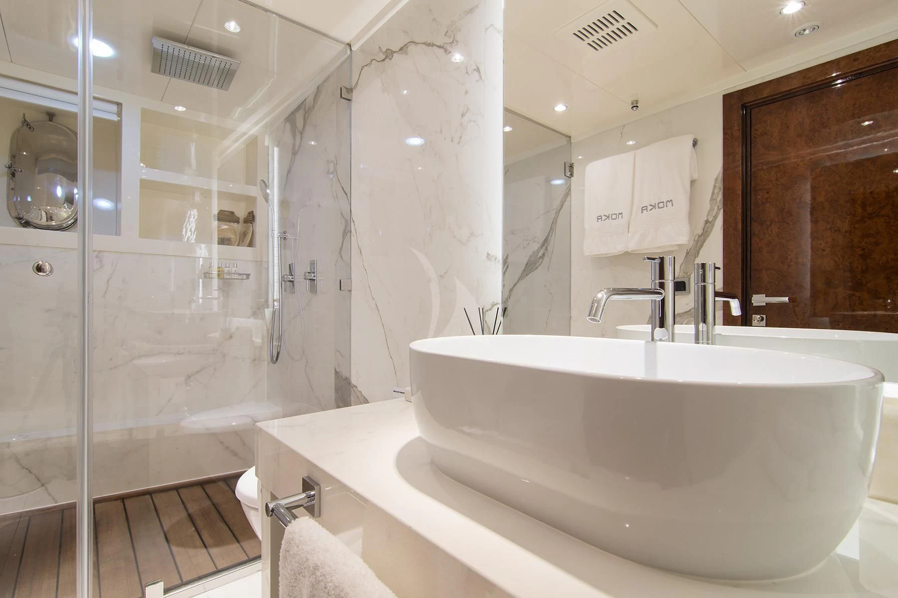 a bathroom with a sink and a shower aboard HALLO Yacht for Sale