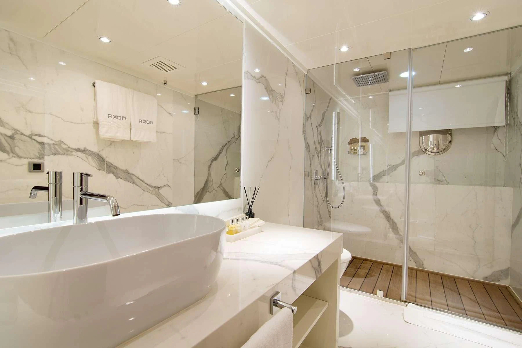 a bathroom with a large bathtub aboard HALLO Yacht for Sale