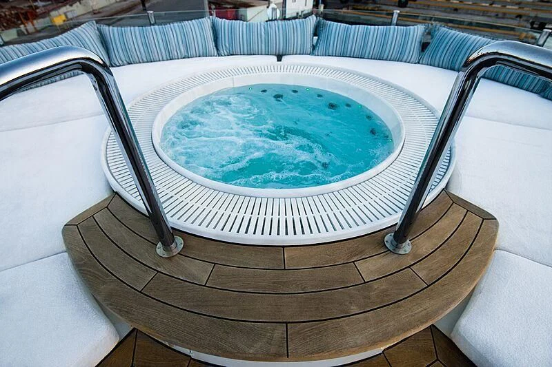 a bowl on a table aboard HALLO Yacht for Sale