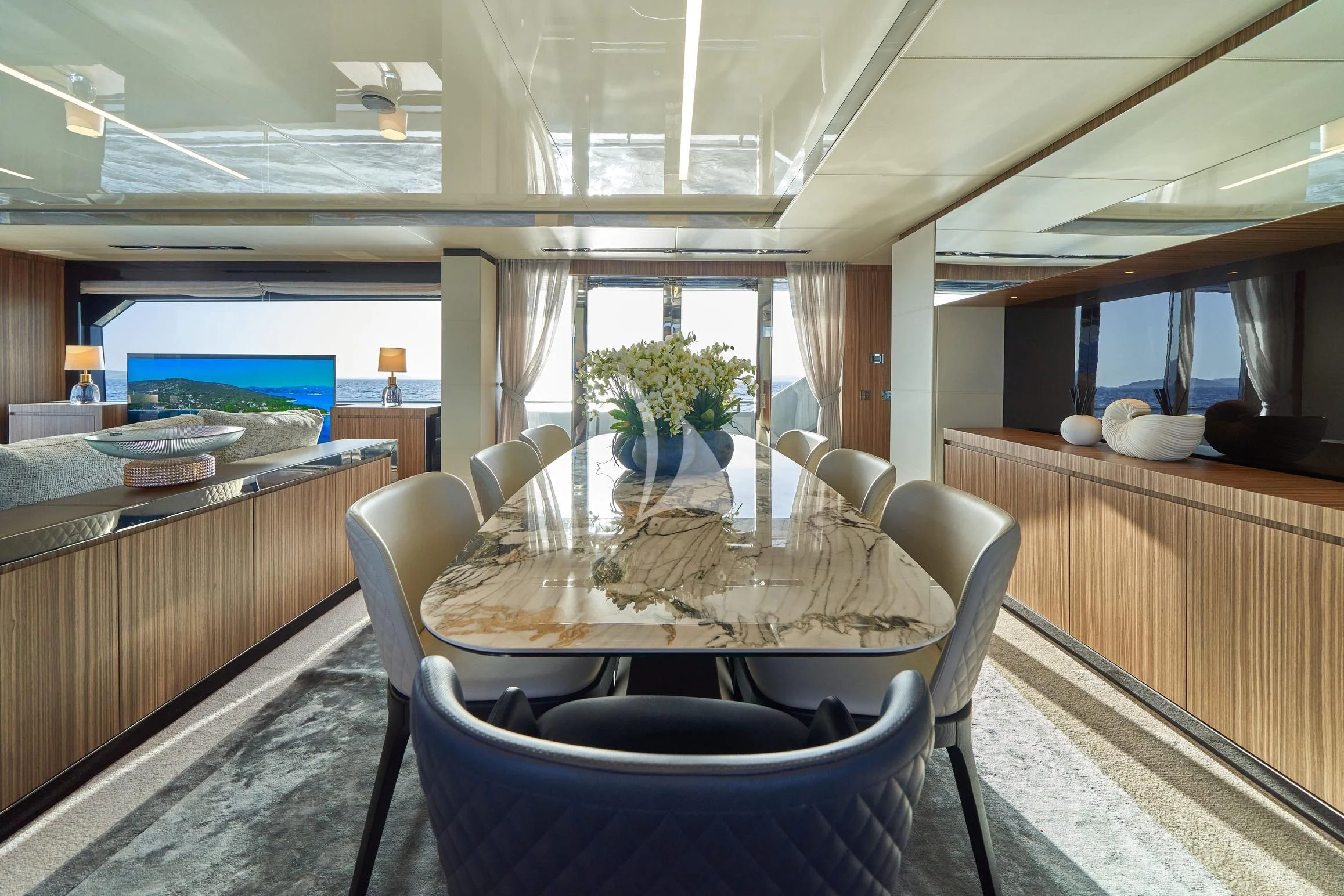 a dining table in a kitchen aboard NIKITA Yacht for Sale
