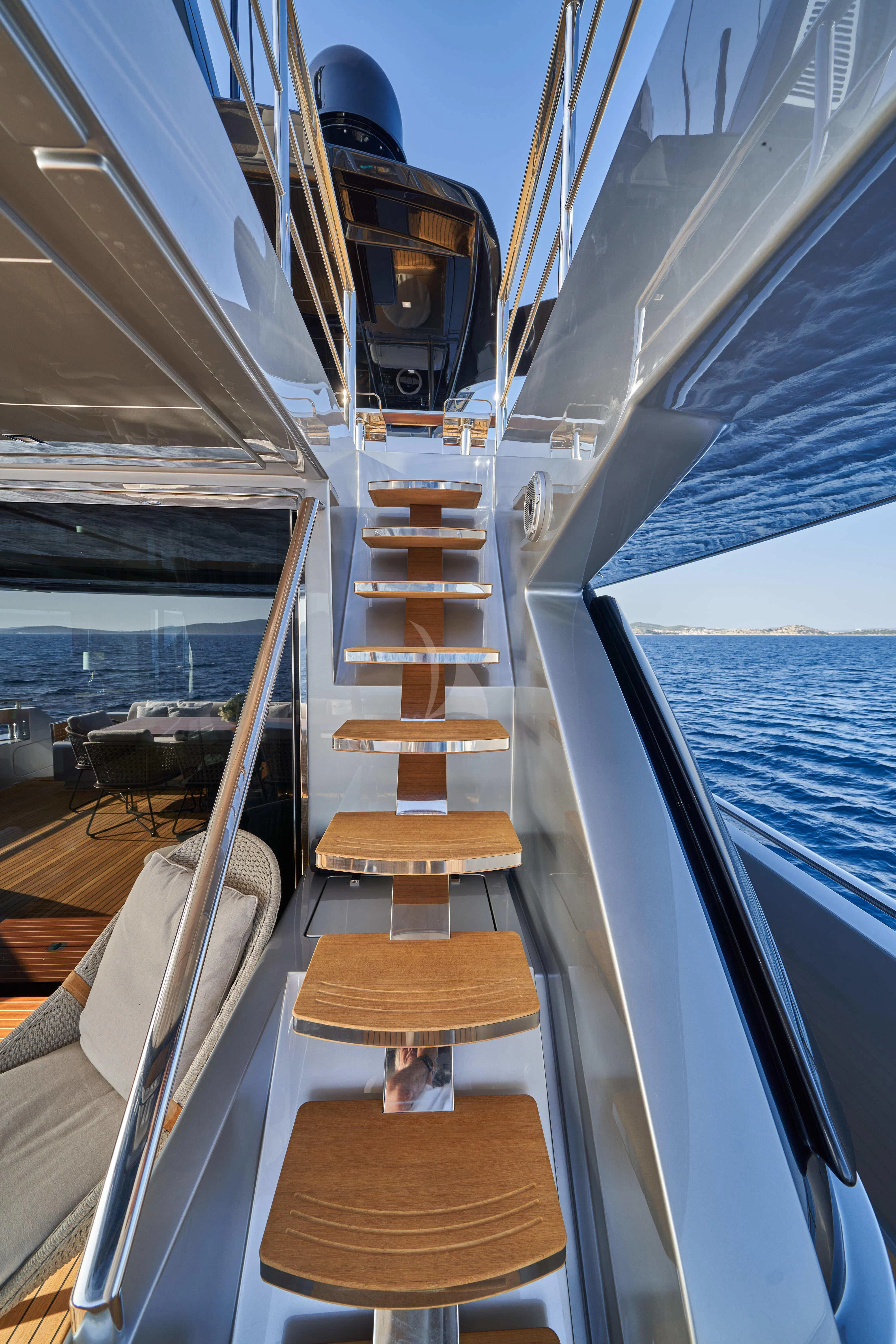 a boat with wood stairs aboard NIKITA Yacht for Sale