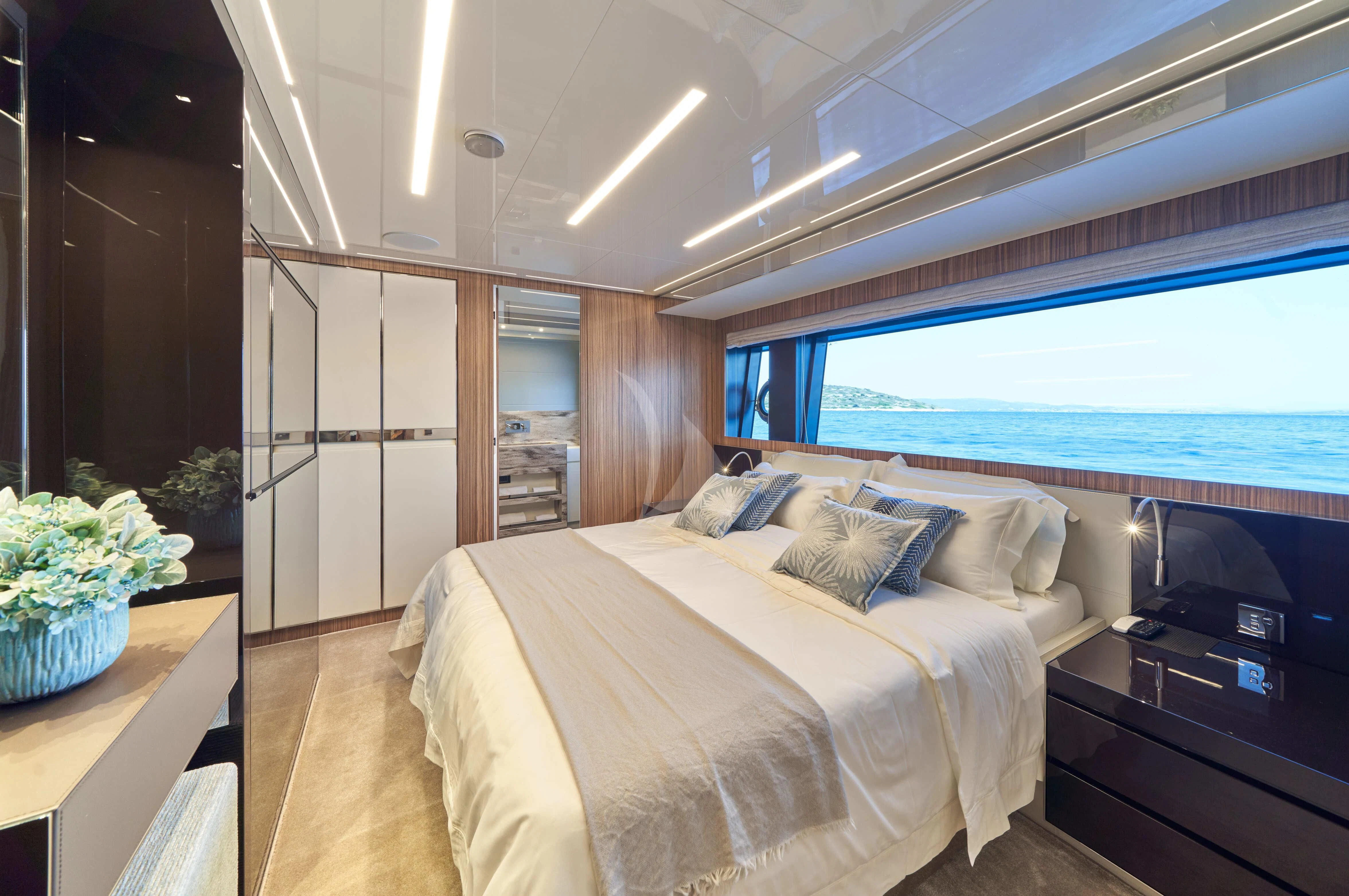 a bed in a room aboard NIKITA Yacht for Sale