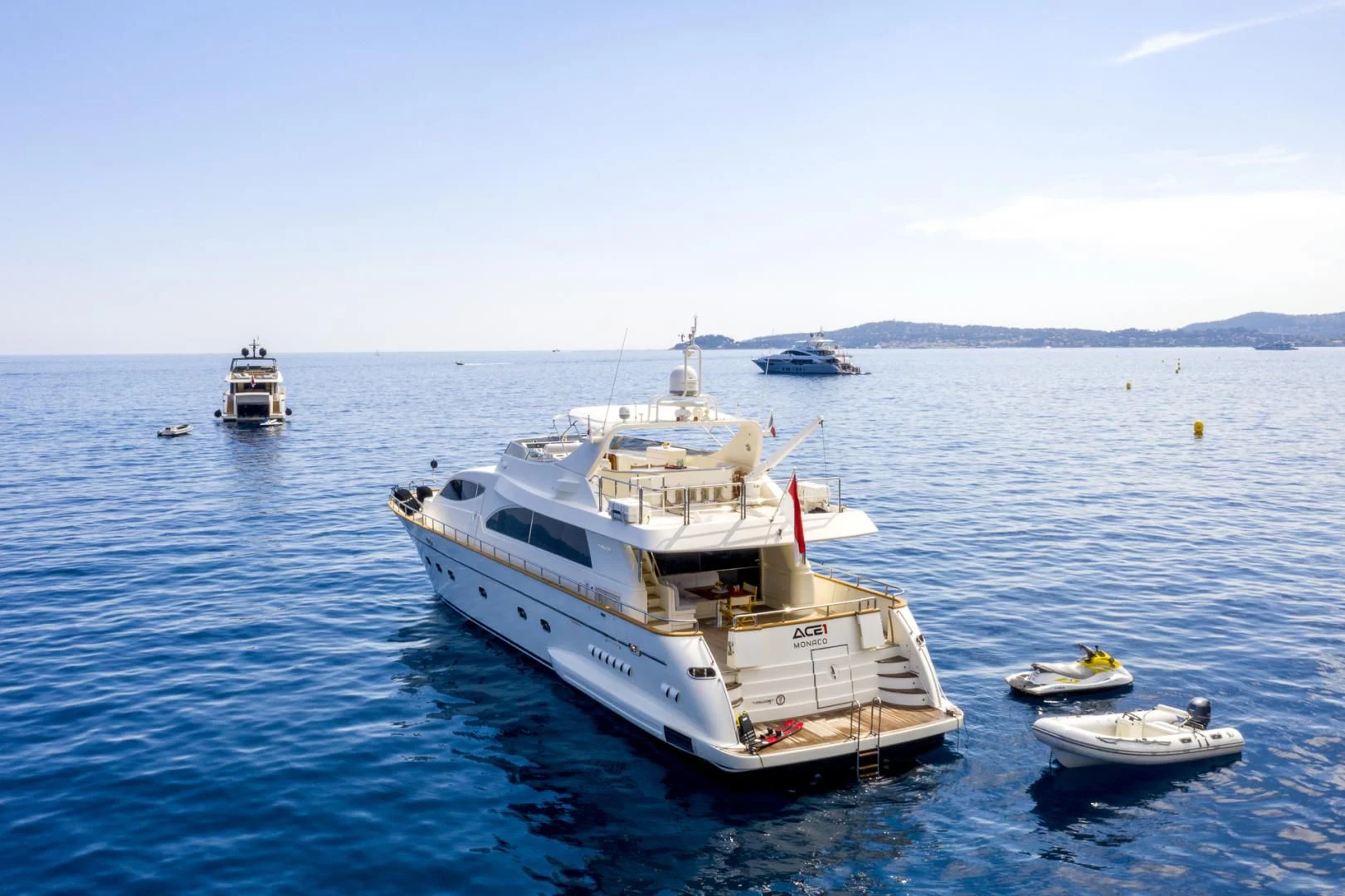 a group of boats in the water aboard ACE1 Yacht for Sale