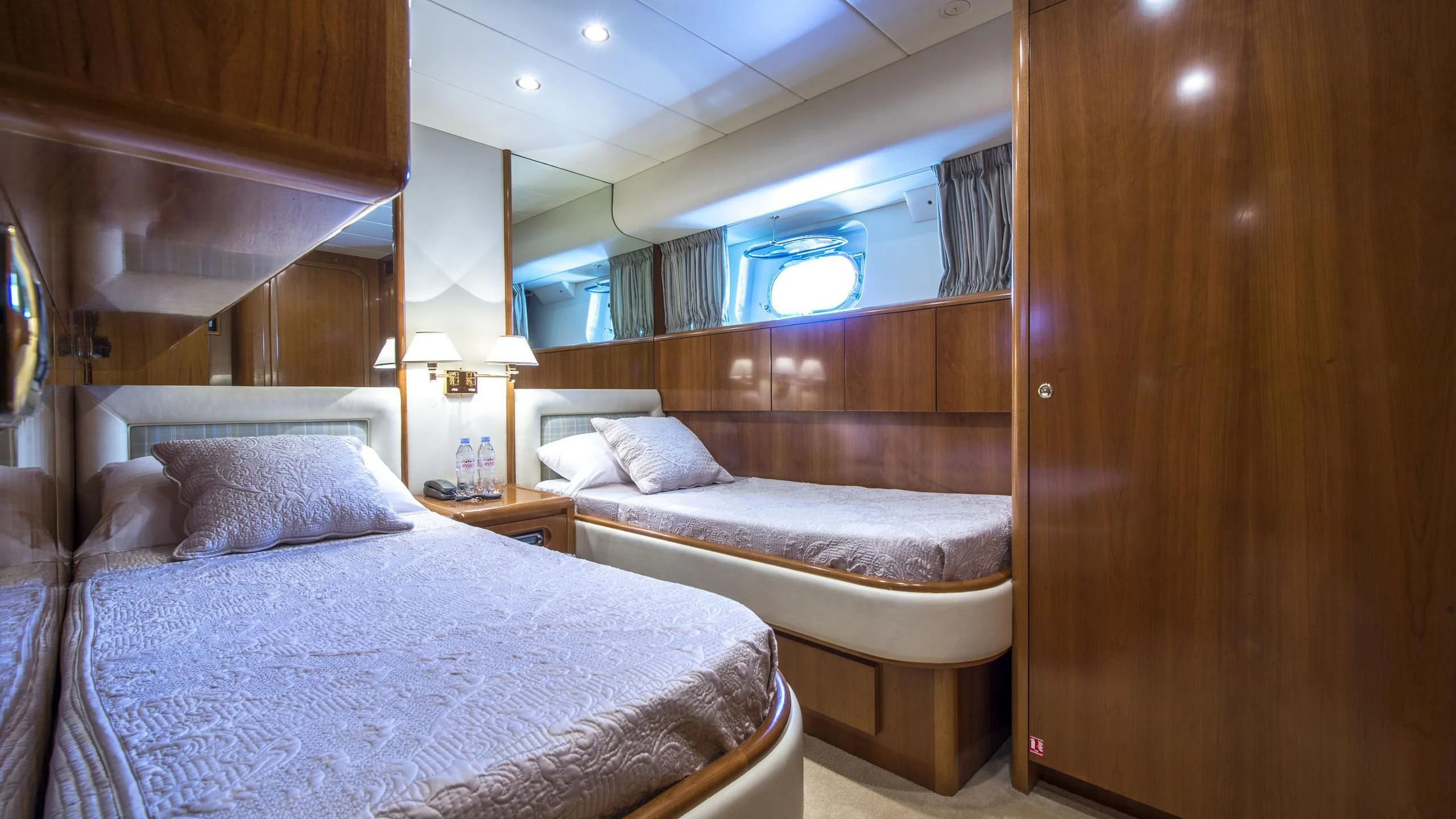 a room with two beds aboard ACE1 Yacht for Sale