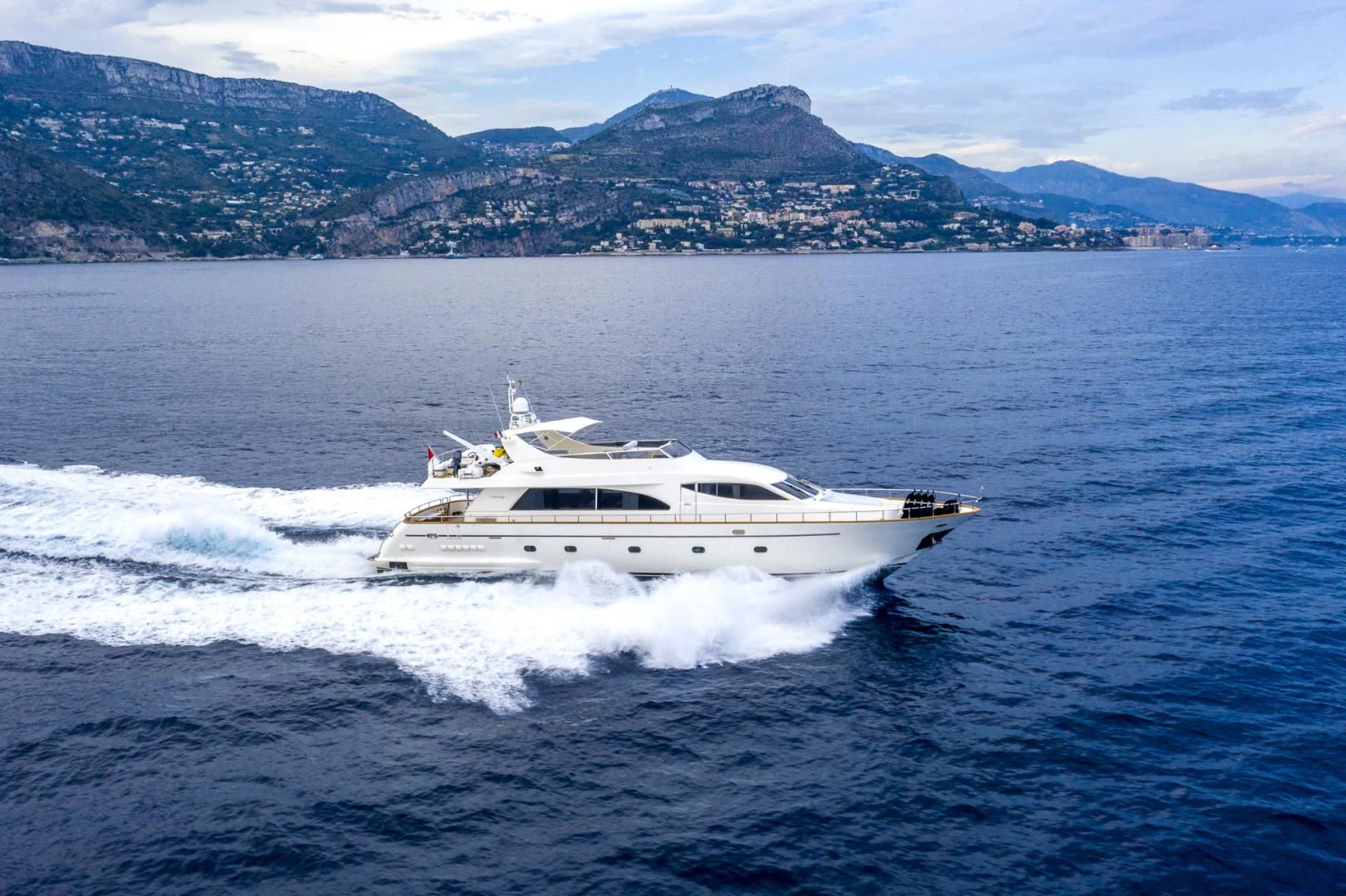 a white yacht on the water aboard ACE1 Yacht for Sale