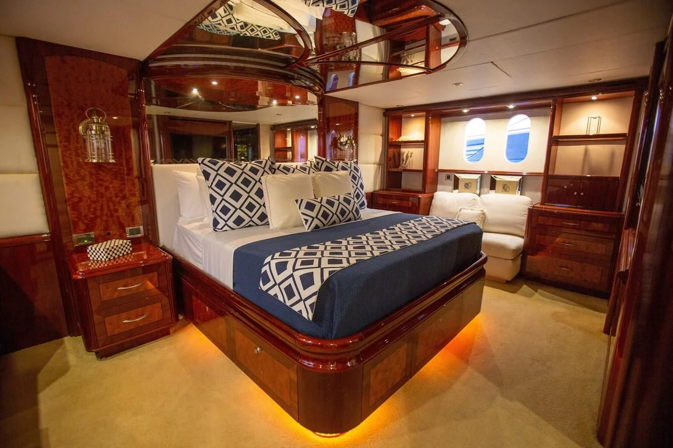 a bed in a room aboard LAZZARA 80' Yacht for Sale