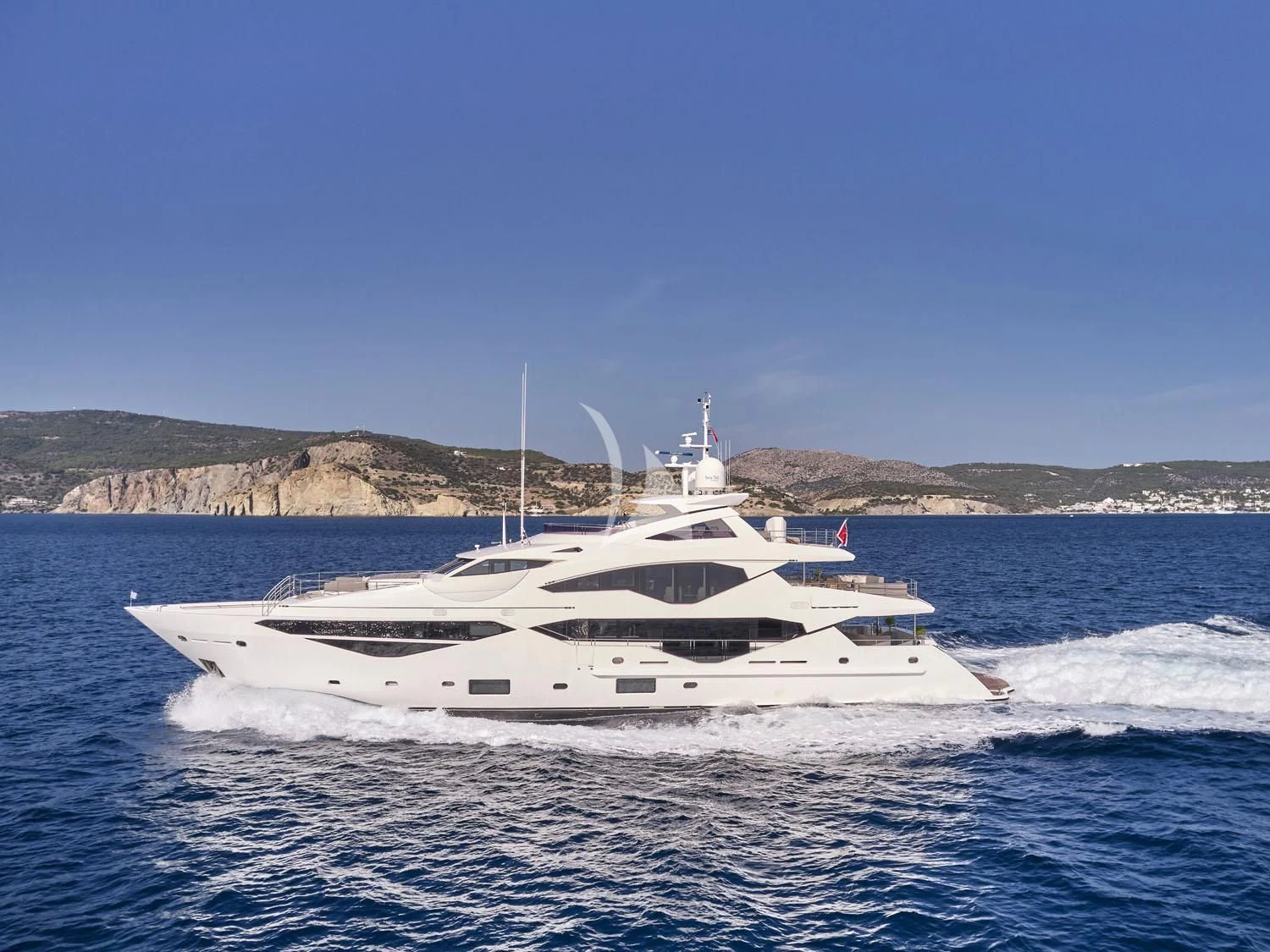 a white yacht in the water aboard AQUA LIBRA Yacht for Charter
