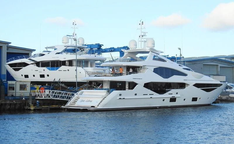 a large white boat aboard AQUA LIBRA Yacht for Charter
