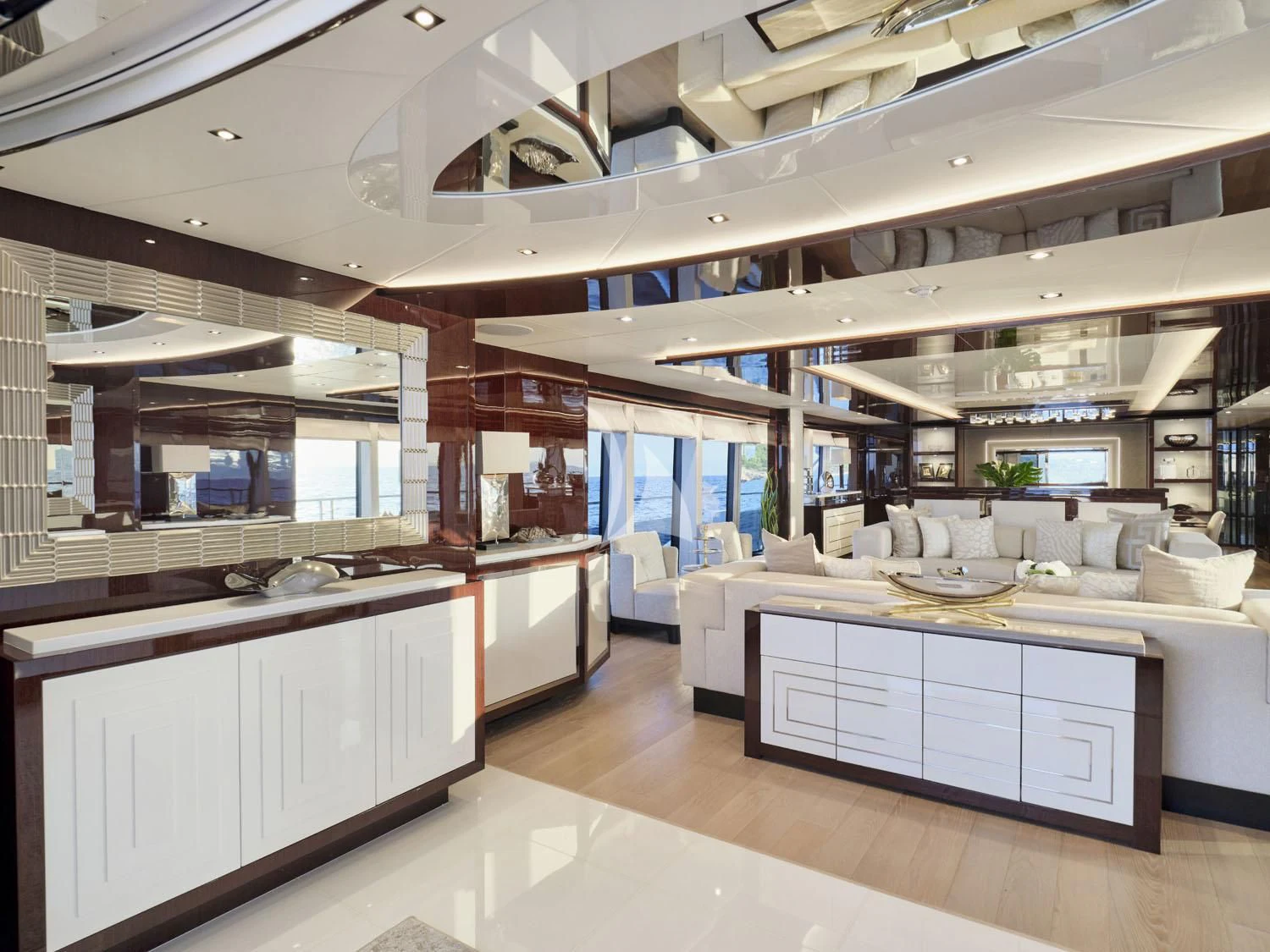 a large kitchen with white cabinets aboard AQUA LIBRA Yacht for Charter