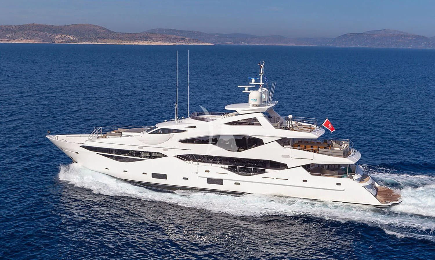 a white yacht on the water aboard AQUA LIBRA Yacht for Charter