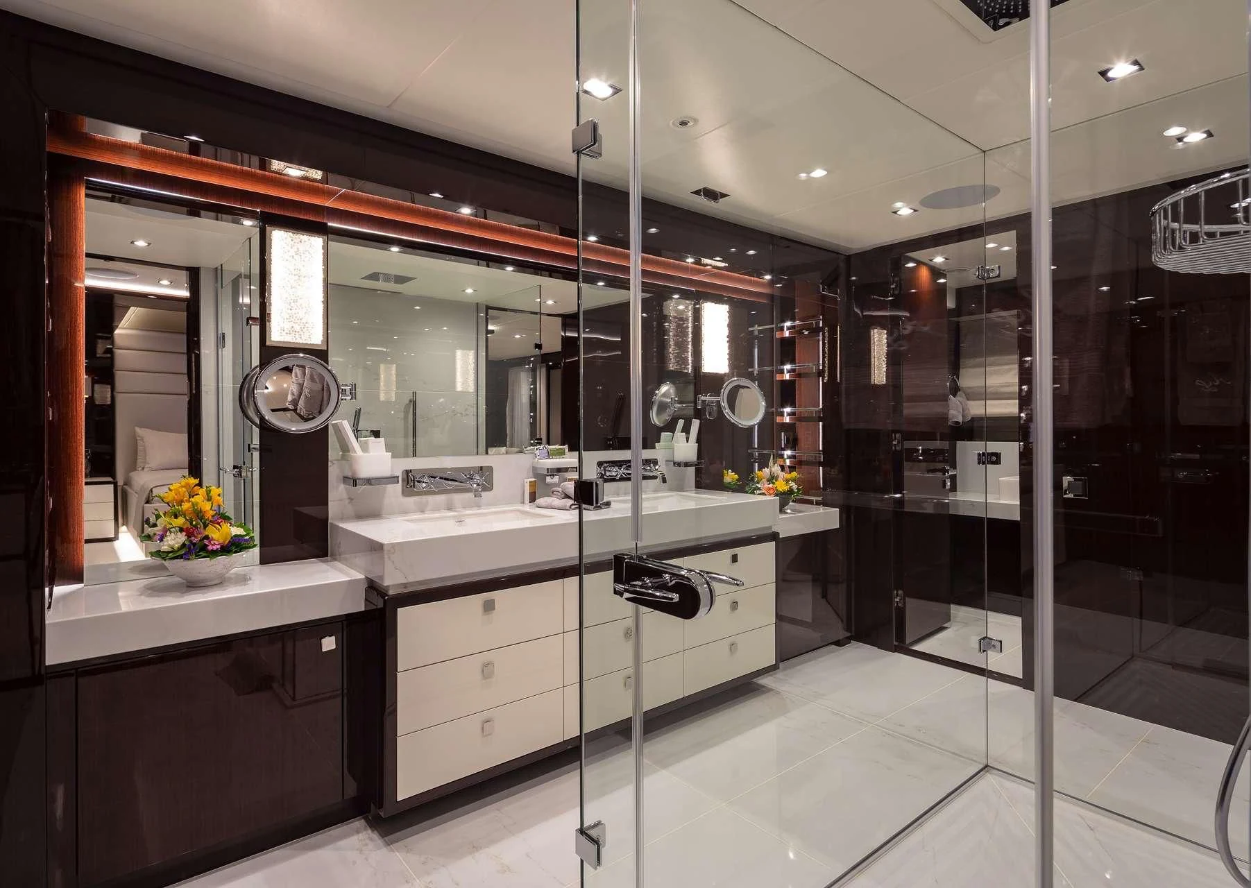 a bathroom with a glass shower aboard AQUA LIBRA Yacht for Charter