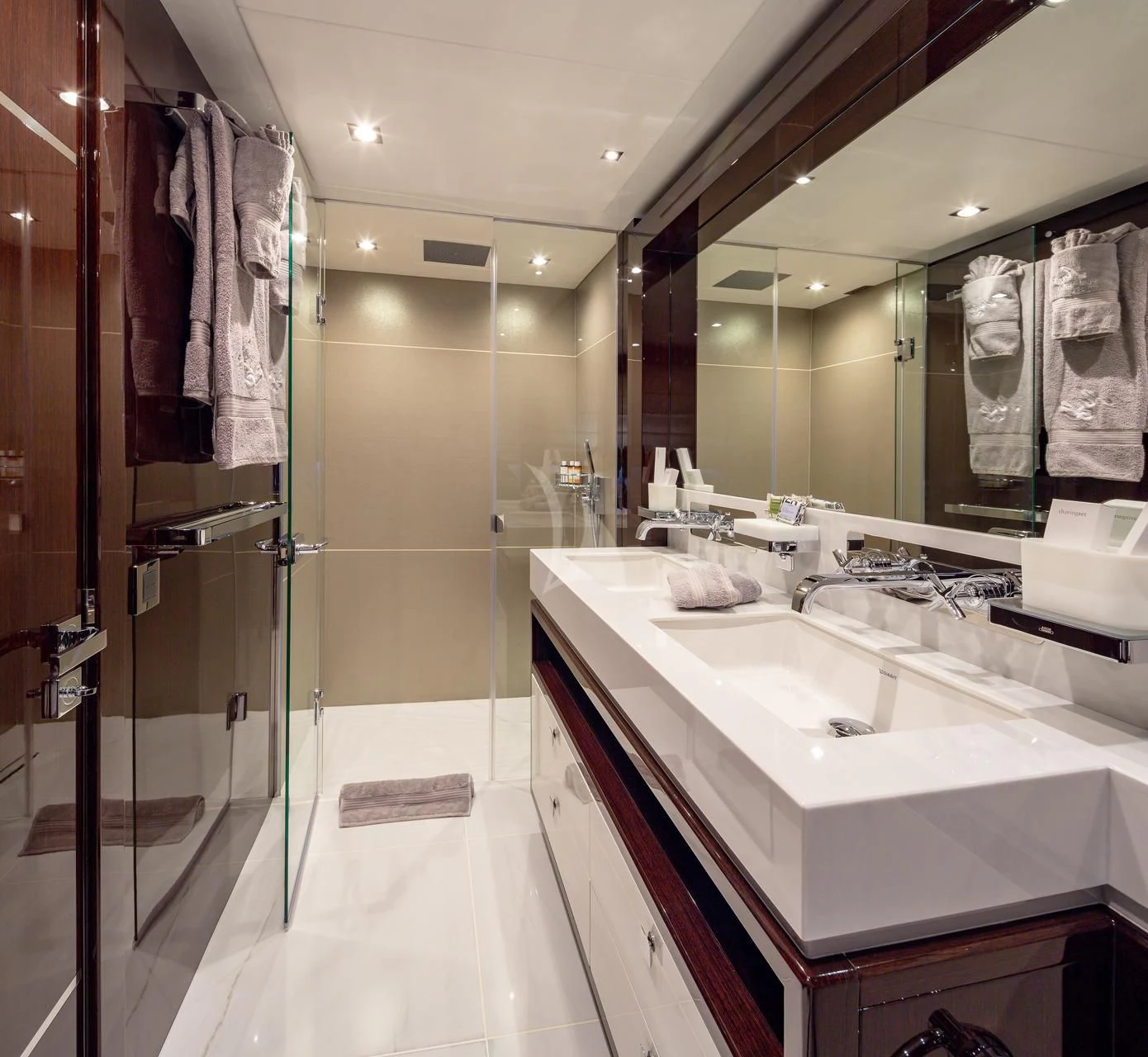 a bathroom with a large mirror aboard AQUA LIBRA Yacht for Charter