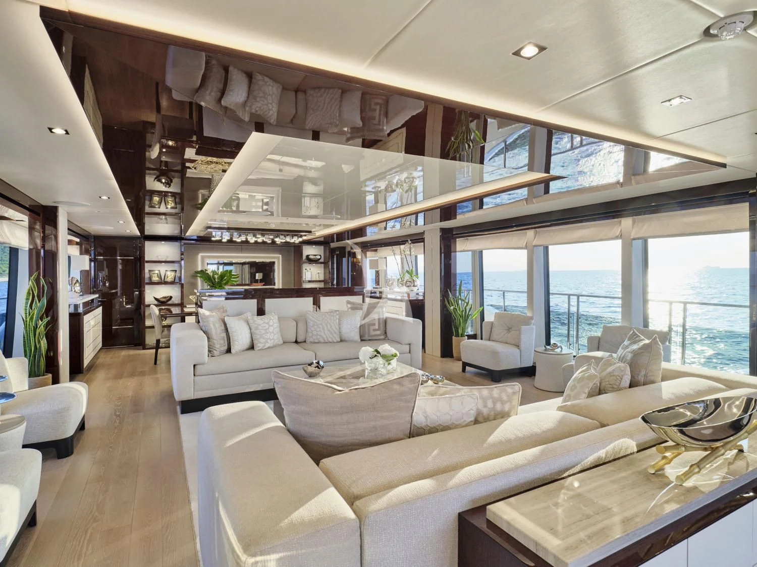 a living room with a large window aboard AQUA LIBRA Yacht for Charter