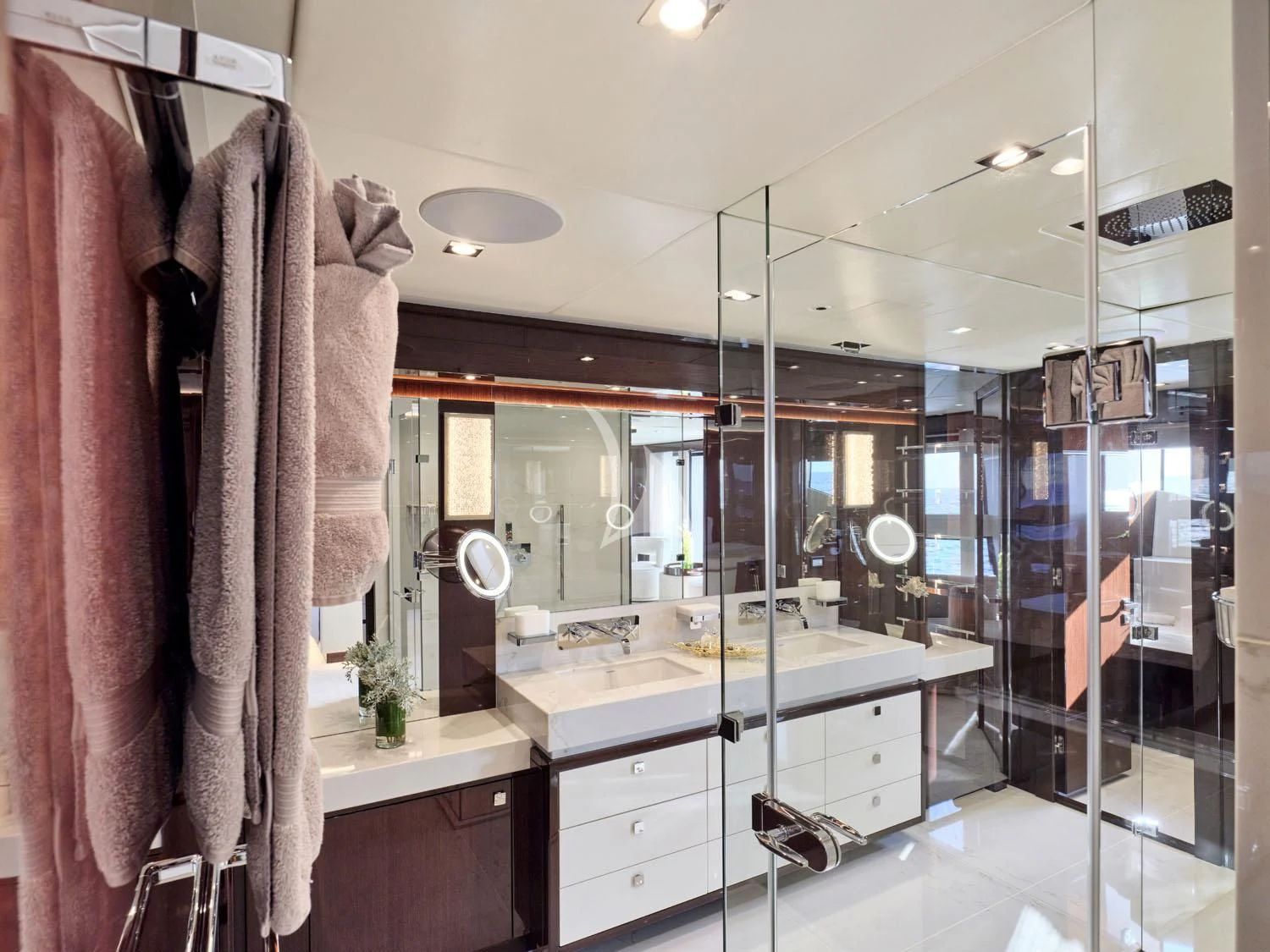 a bathroom with a large mirror aboard AQUA LIBRA Yacht for Charter