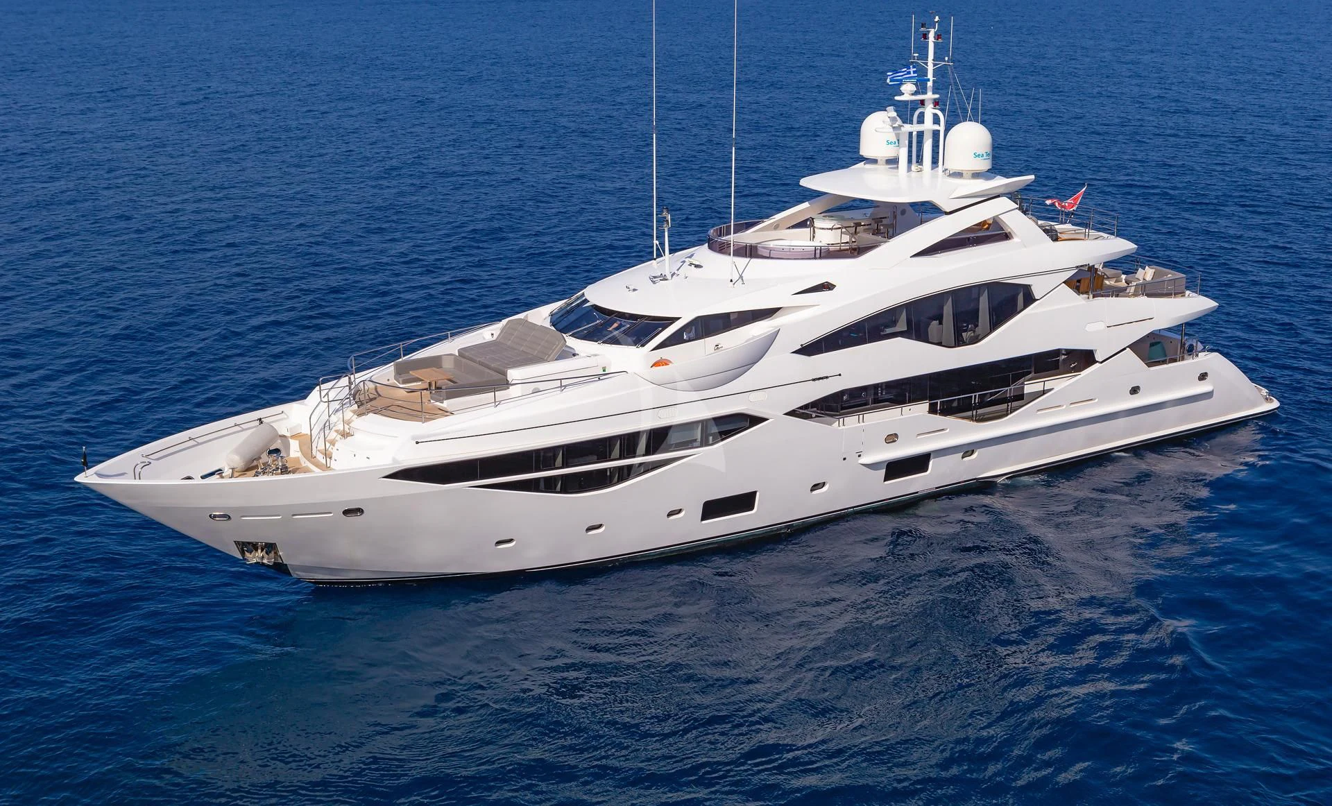 a white yacht in the water aboard AQUA LIBRA Yacht for Charter