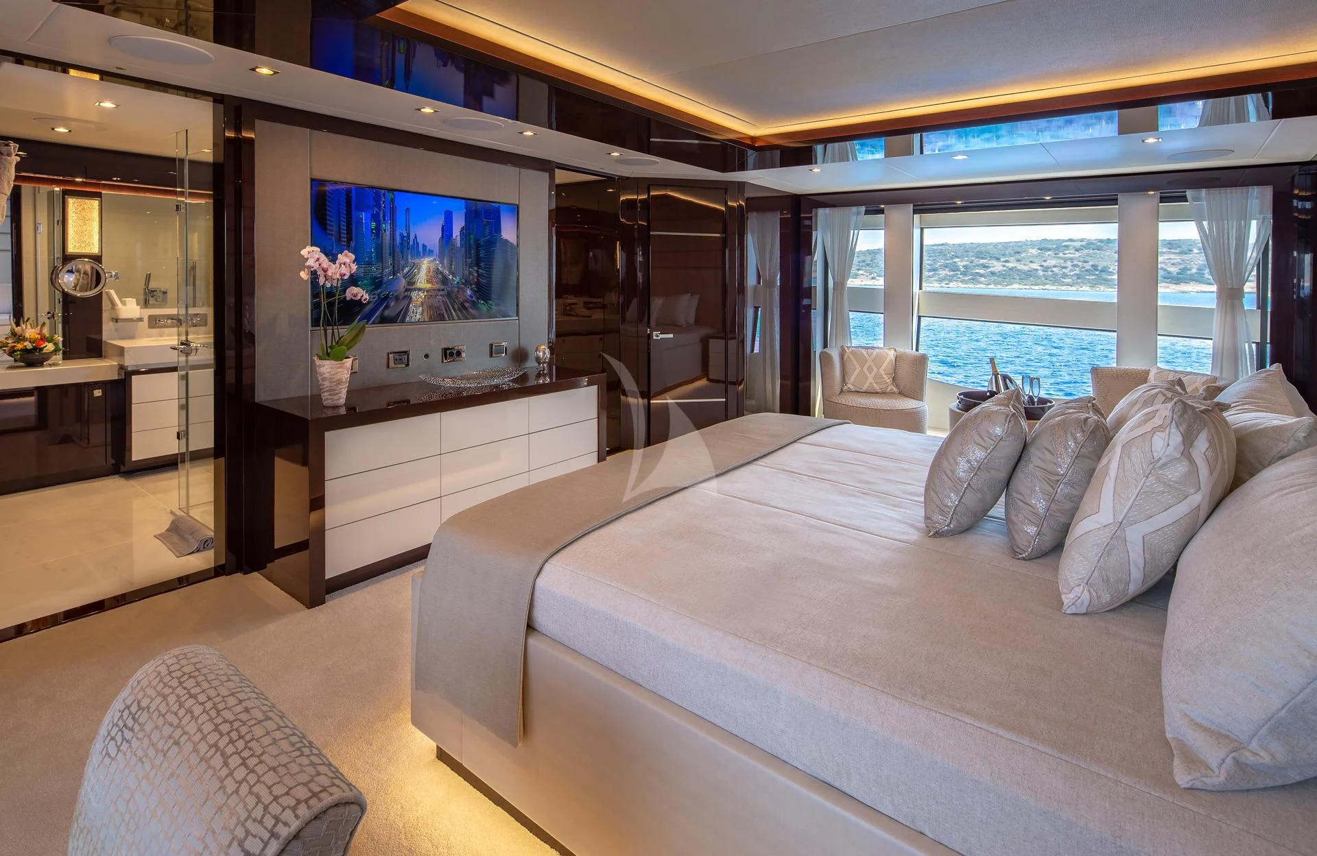 a large bed in a room aboard AQUA LIBRA Yacht for Charter