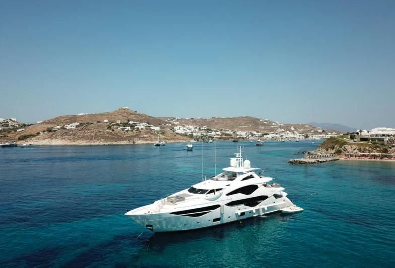 a white yacht in the water aboard AQUA LIBRA Yacht for Charter