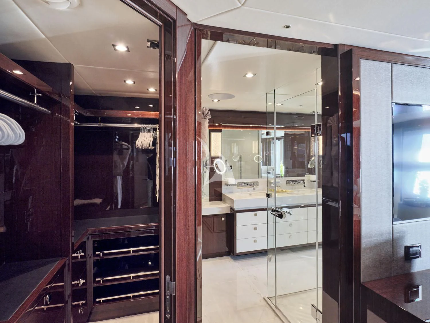 a room with a glass door aboard AQUA LIBRA Yacht for Charter