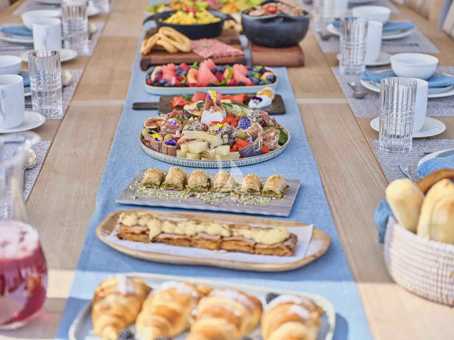 a table full of food aboard AQUA LIBRA Yacht for Charter