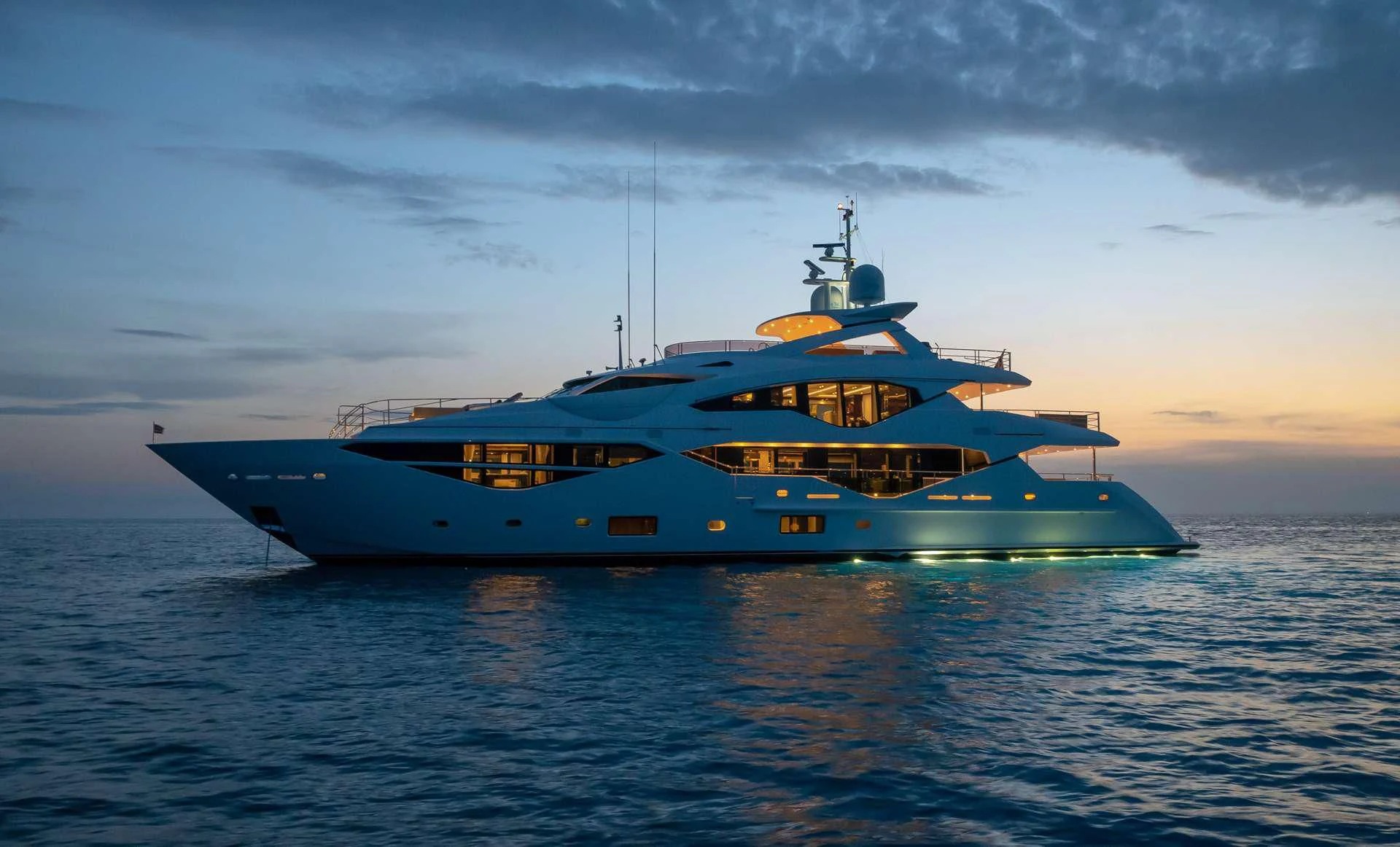 a large ship in the water aboard AQUA LIBRA Yacht for Charter