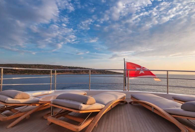 a flag on a boat aboard AQUA LIBRA Yacht for Charter