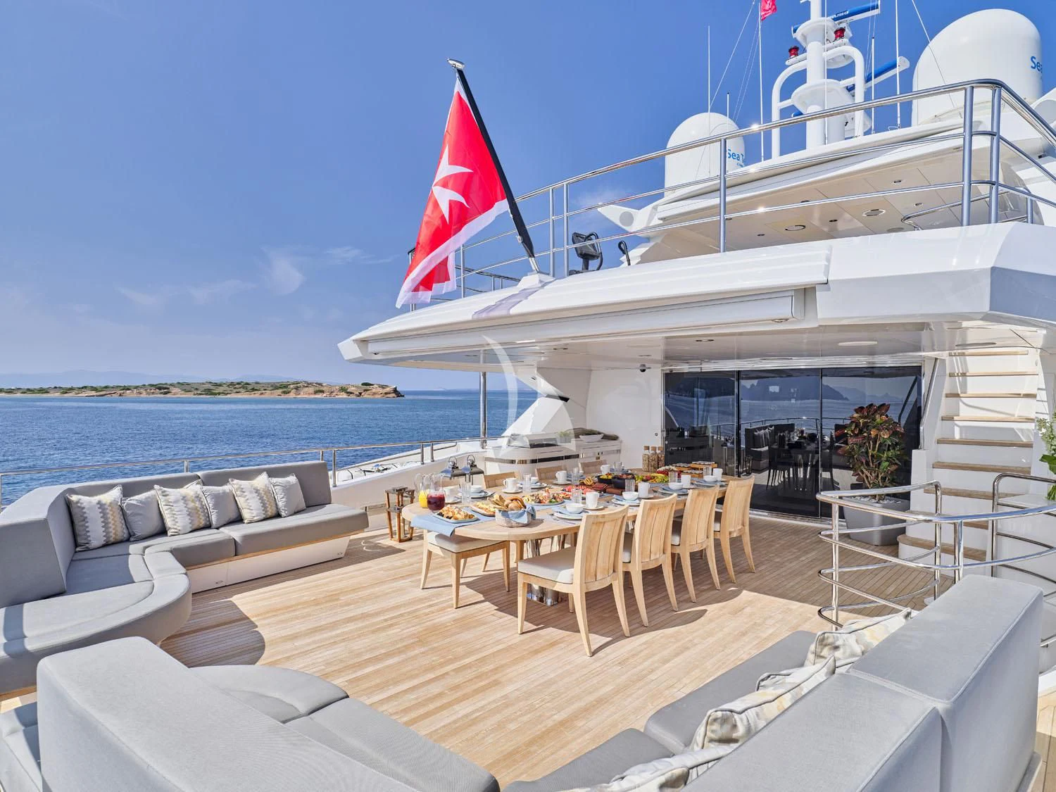 a large boat on the water aboard AQUA LIBRA Yacht for Charter