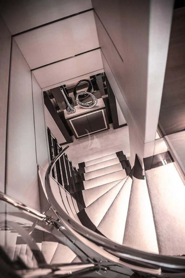 a staircase with a light aboard AQUA LIBRA Yacht for Charter