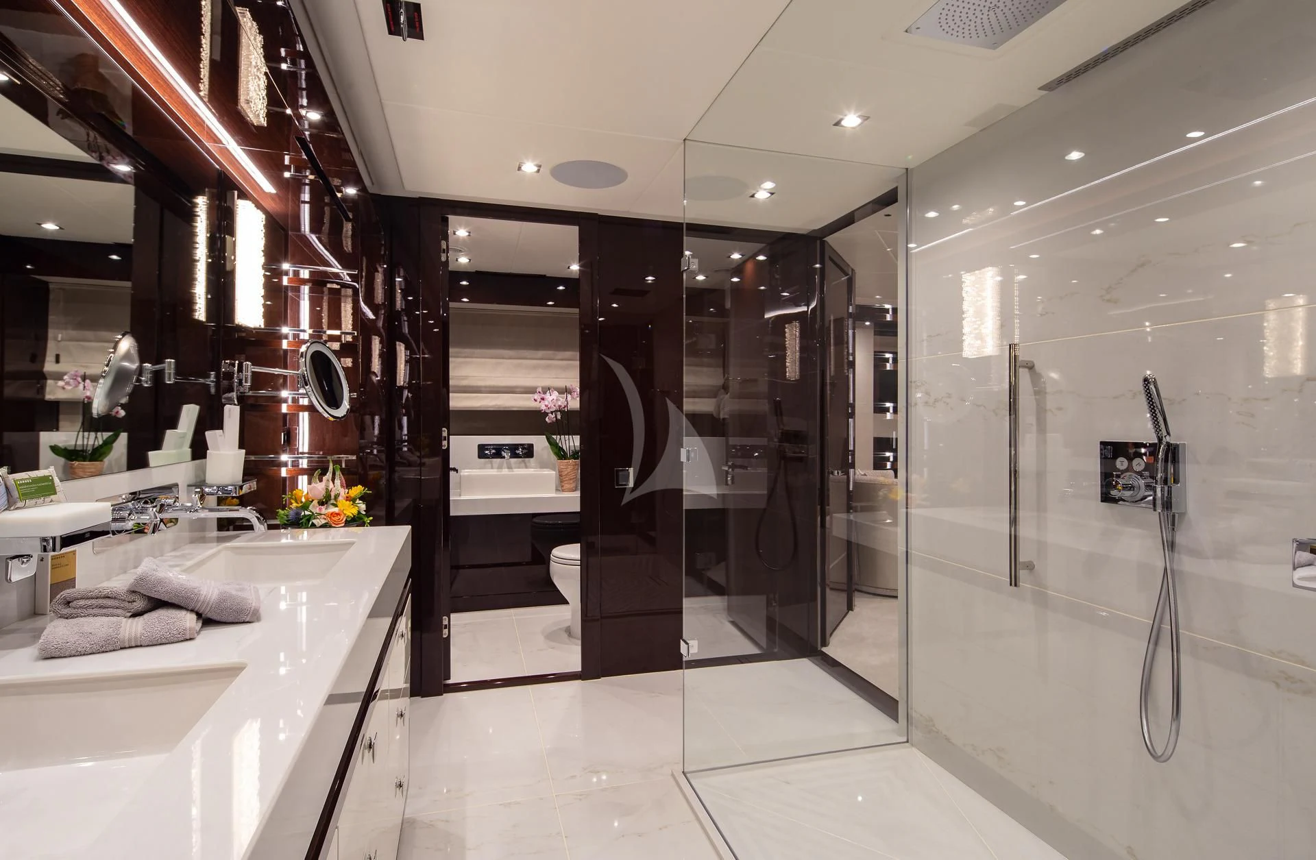 a bathroom with a large mirror aboard AQUA LIBRA Yacht for Charter