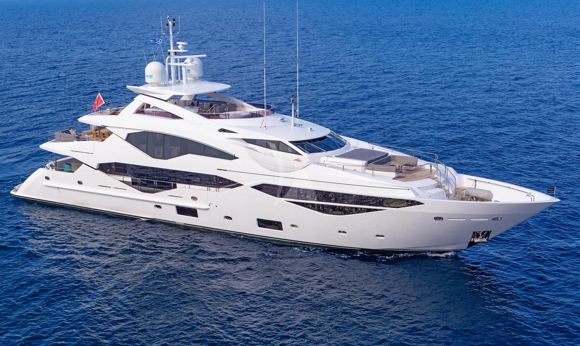 a white yacht on the water aboard AQUA LIBRA Yacht for Charter