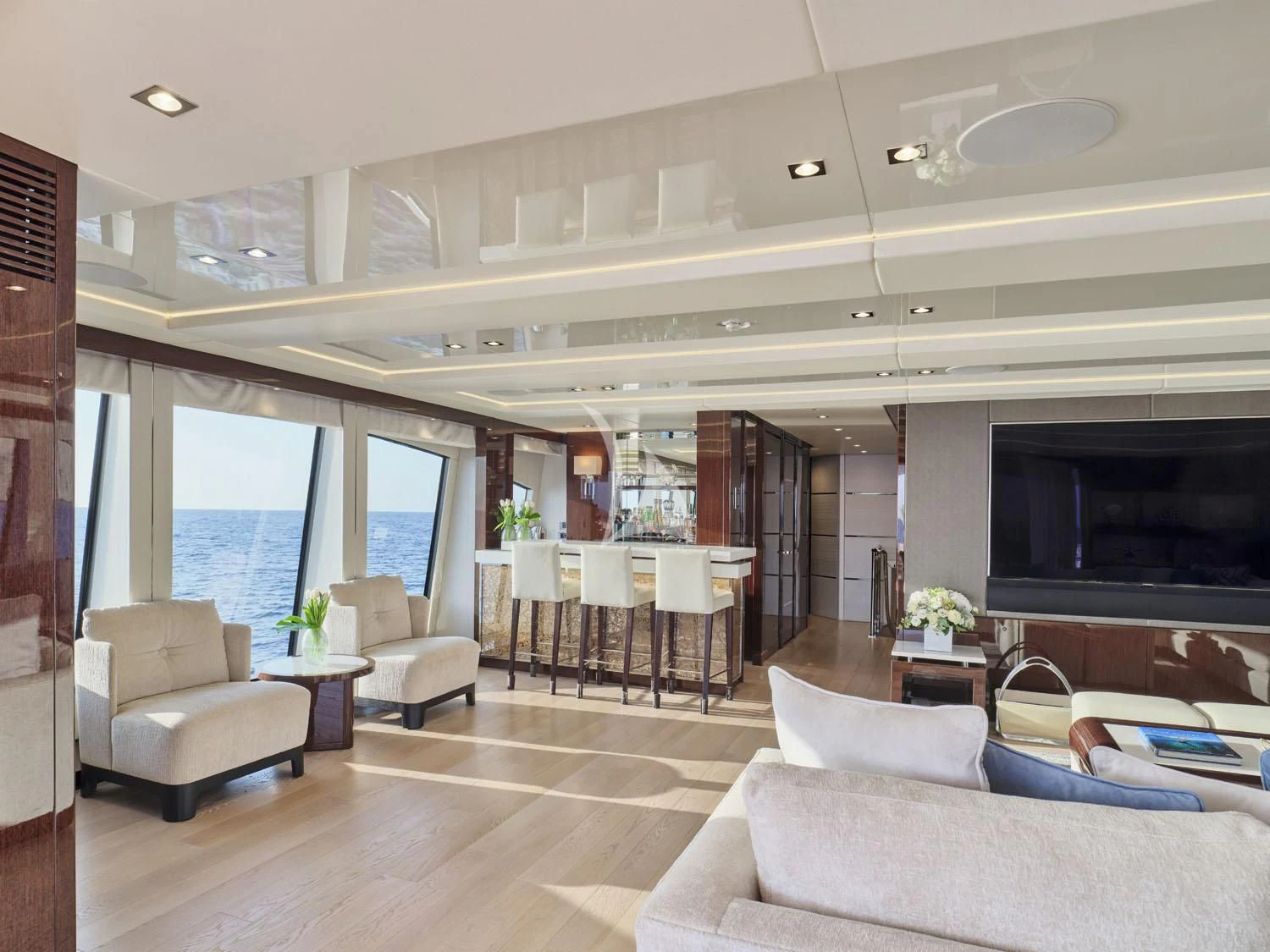 a living room with a large window aboard AQUA LIBRA Yacht for Charter