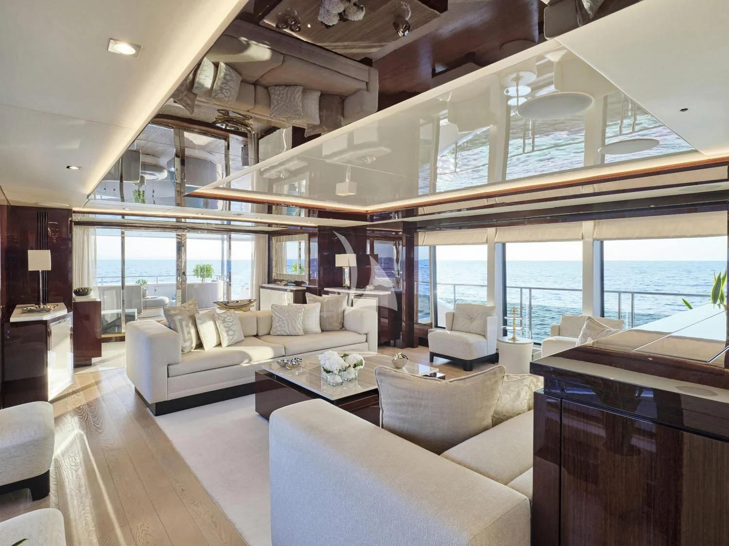 a living room with a large window aboard AQUA LIBRA Yacht for Charter