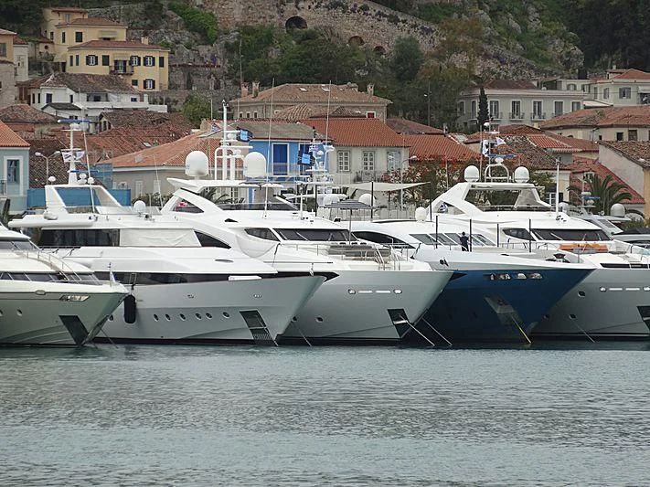 a group of boats in the water aboard AQUA LIBRA Yacht for Charter