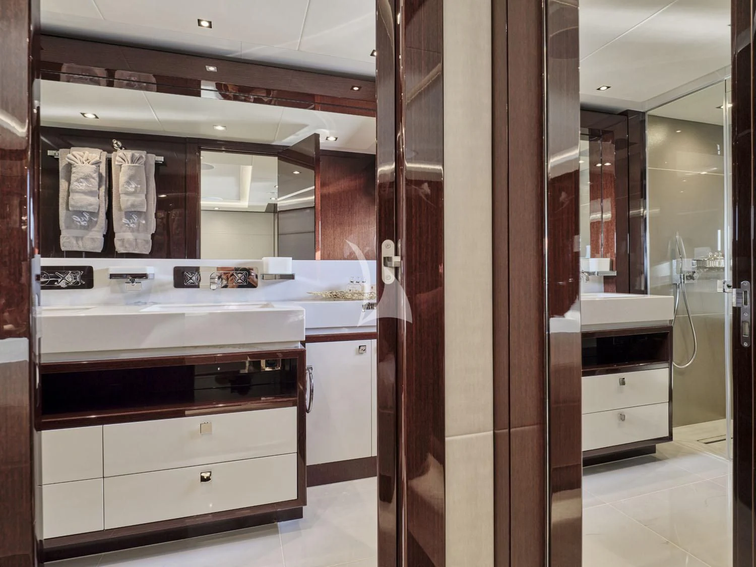 a kitchen with a large wooden door aboard AQUA LIBRA Yacht for Charter