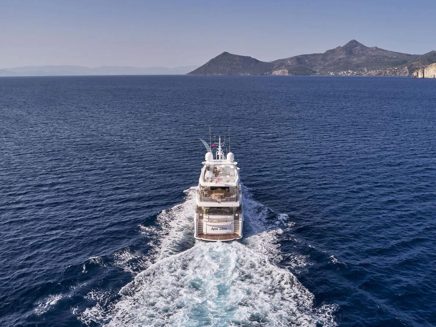 a ship on the water aboard AQUA LIBRA Yacht for Charter