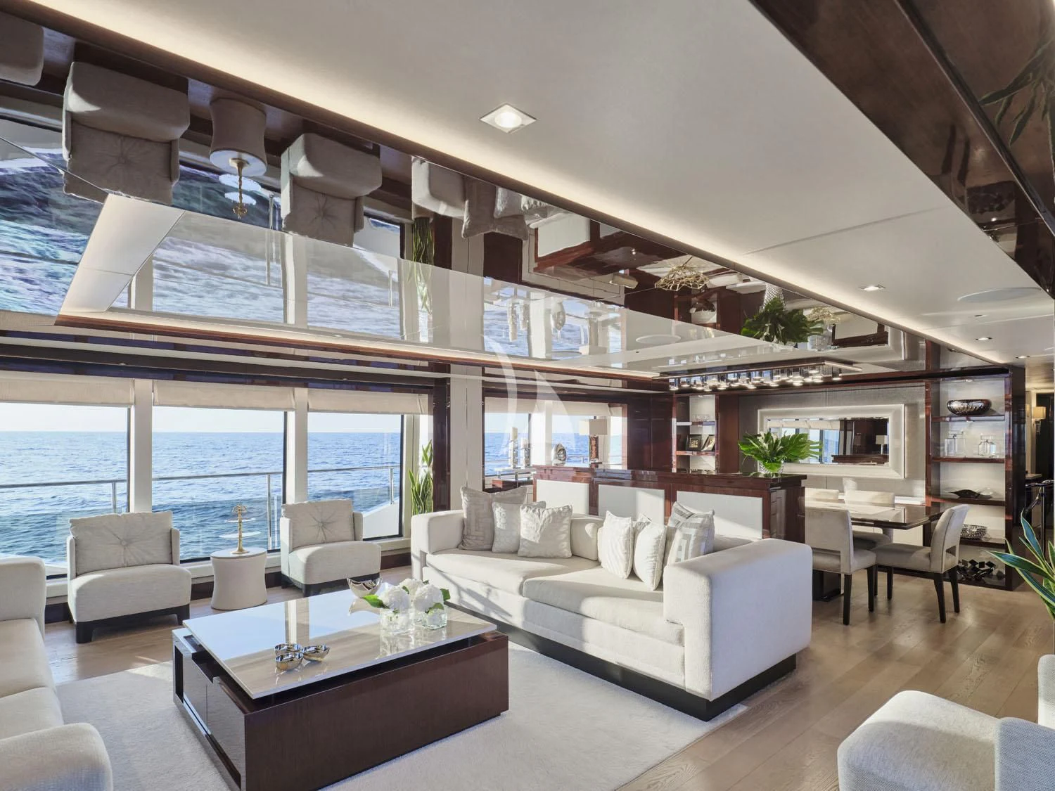 a living room with a large window aboard AQUA LIBRA Yacht for Charter