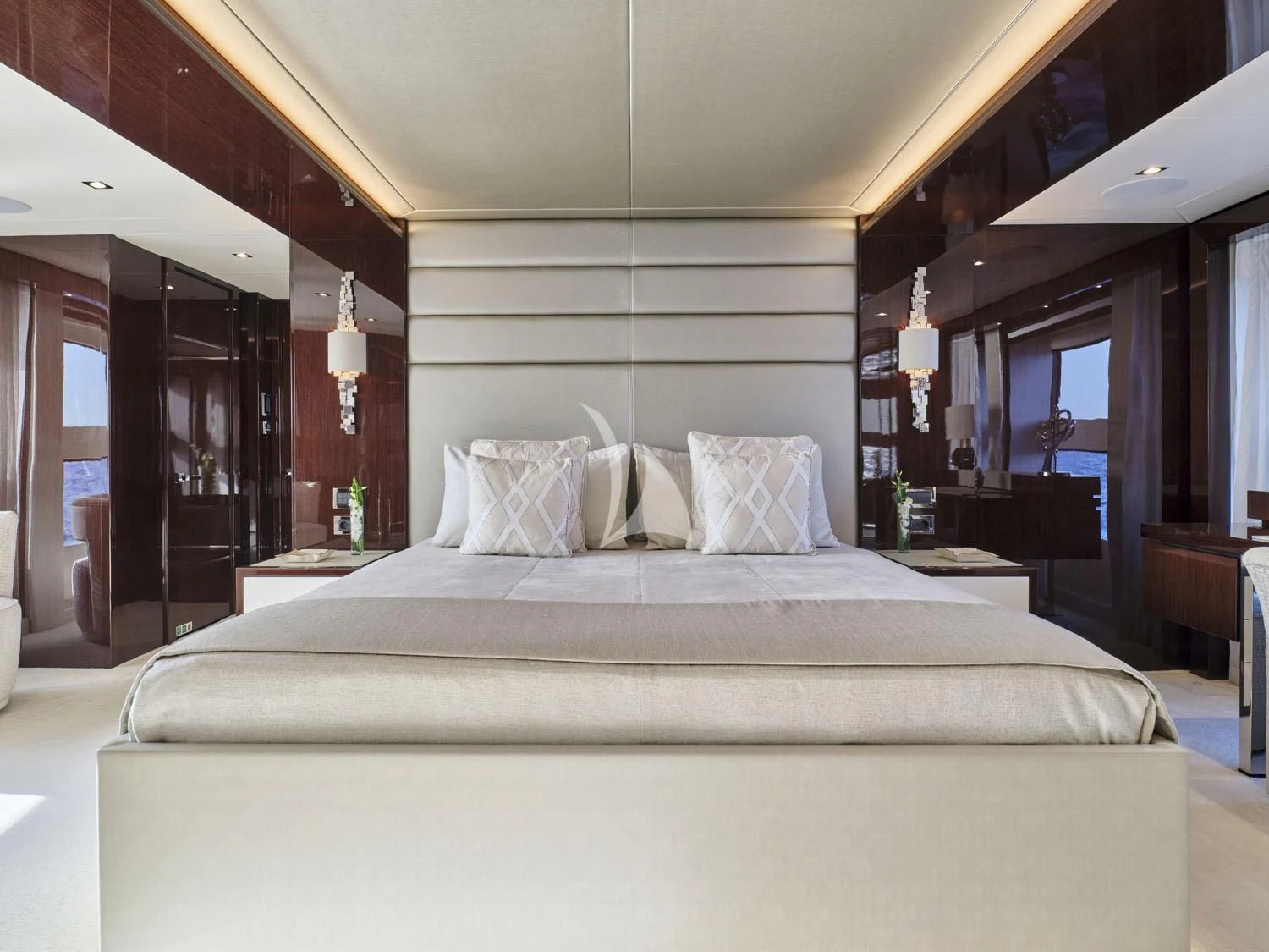 a large bed in a hotel room aboard AQUA LIBRA Yacht for Charter