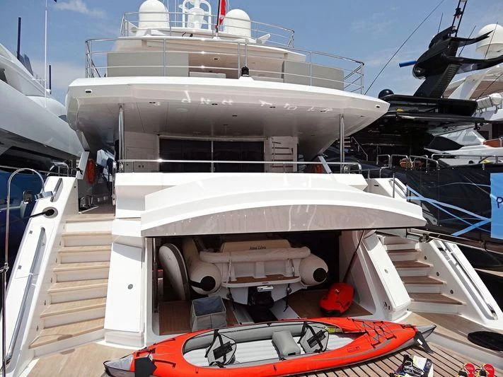 a boat docked at a port aboard AQUA LIBRA Yacht for Charter