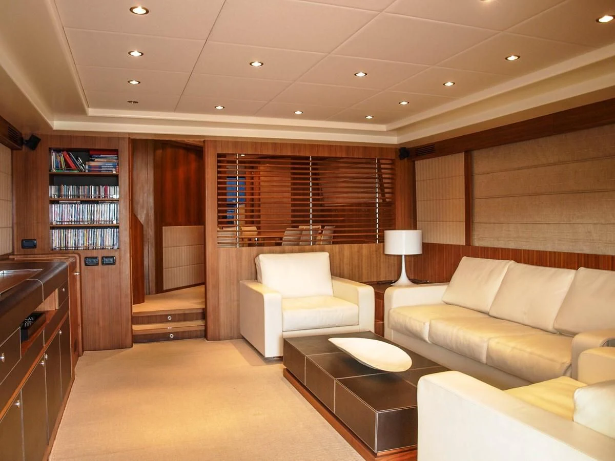 a room with a couch and a table aboard ADEL I Yacht for Sale