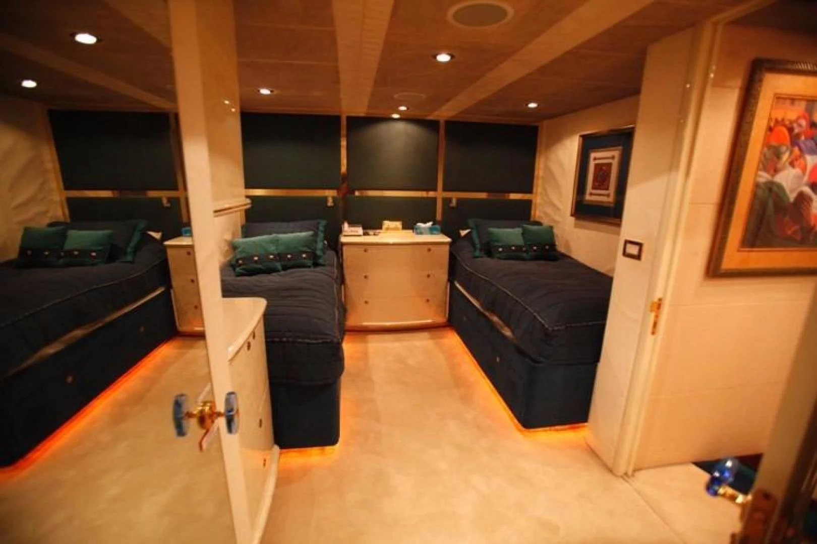 a room with a couch and a desk aboard TAMTEEN Yacht for Sale
