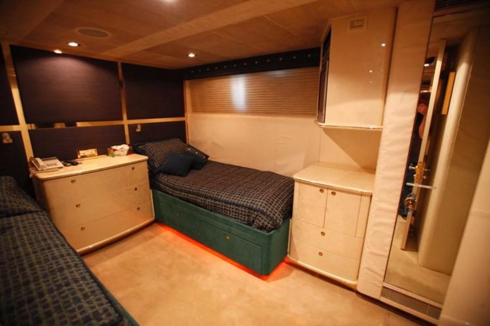 a bed in a room aboard TAMTEEN Yacht for Sale