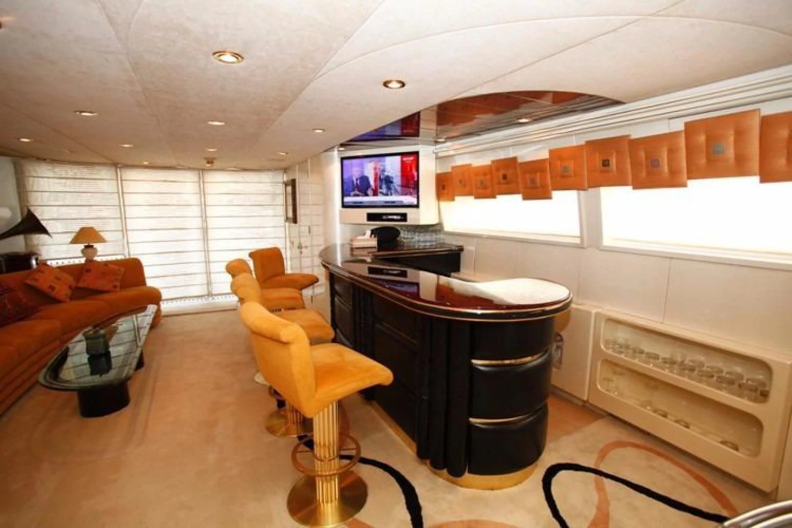 a room with a table and chairs aboard TAMTEEN Yacht for Sale