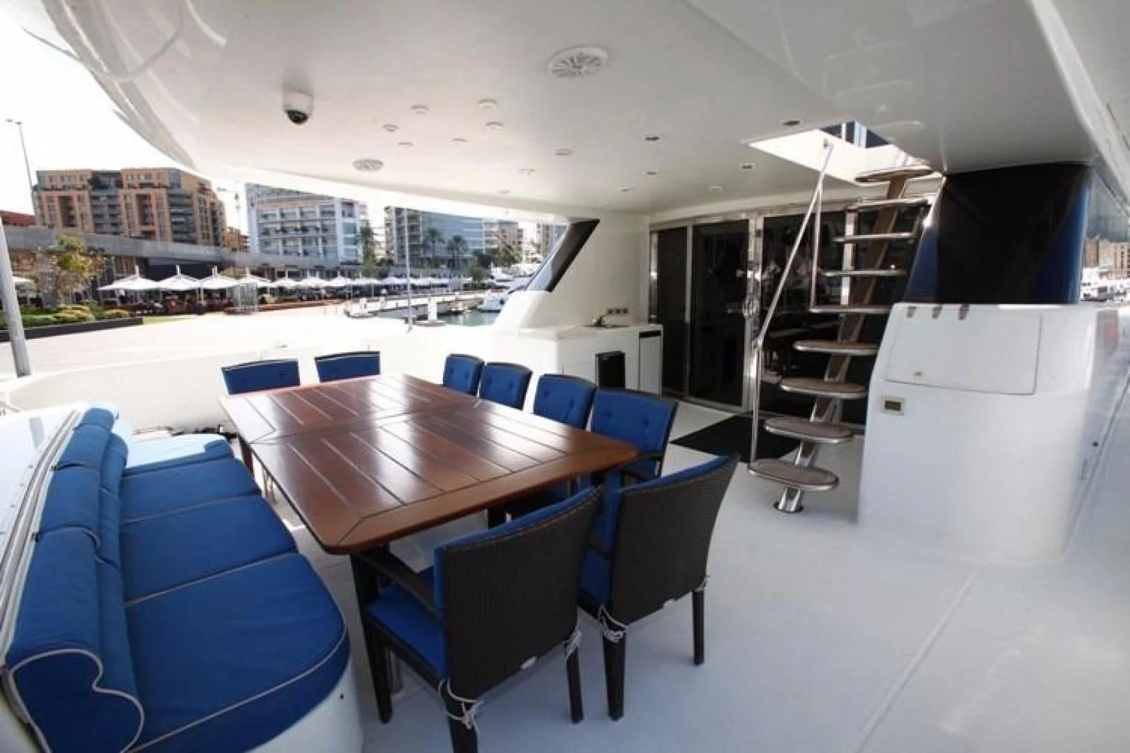 a table and chairs in a room aboard TAMTEEN Yacht for Sale