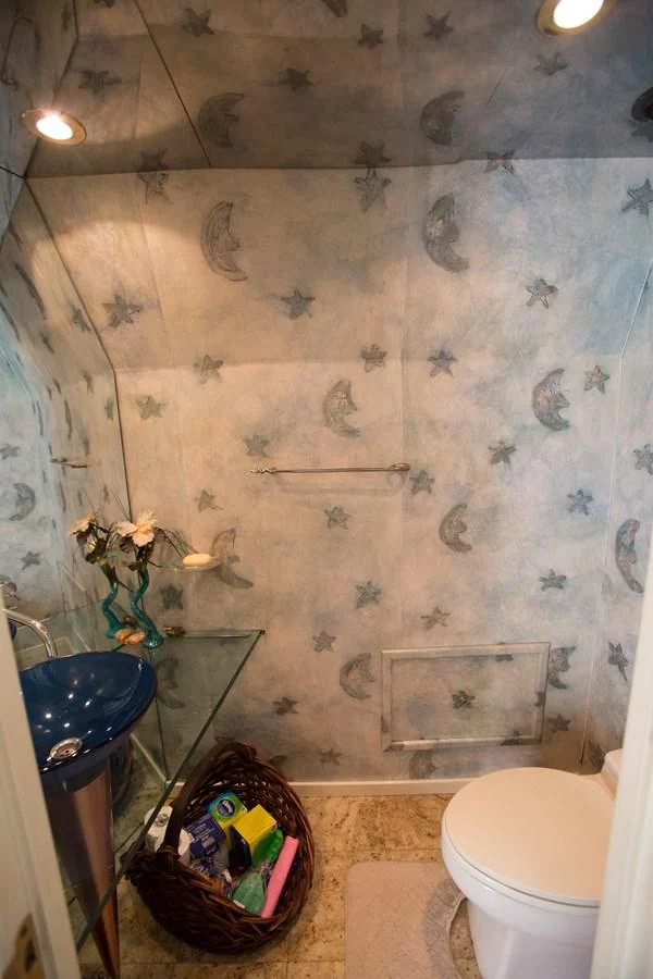 a bathroom with a sink and toilet aboard TAMTEEN Yacht for Sale