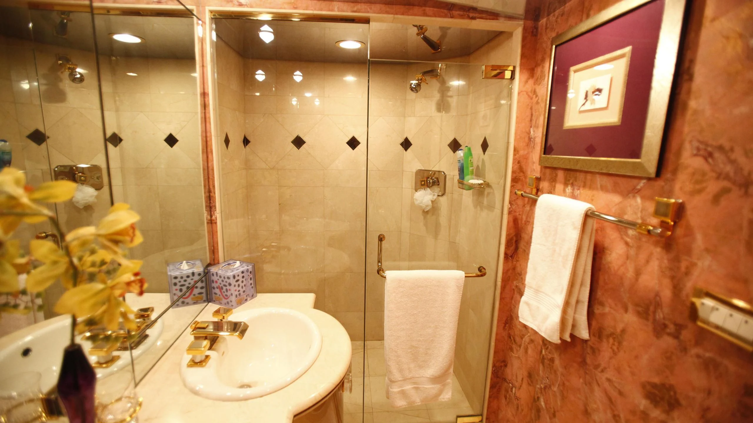 a bathroom with a sink and mirror aboard TAMTEEN Yacht for Sale