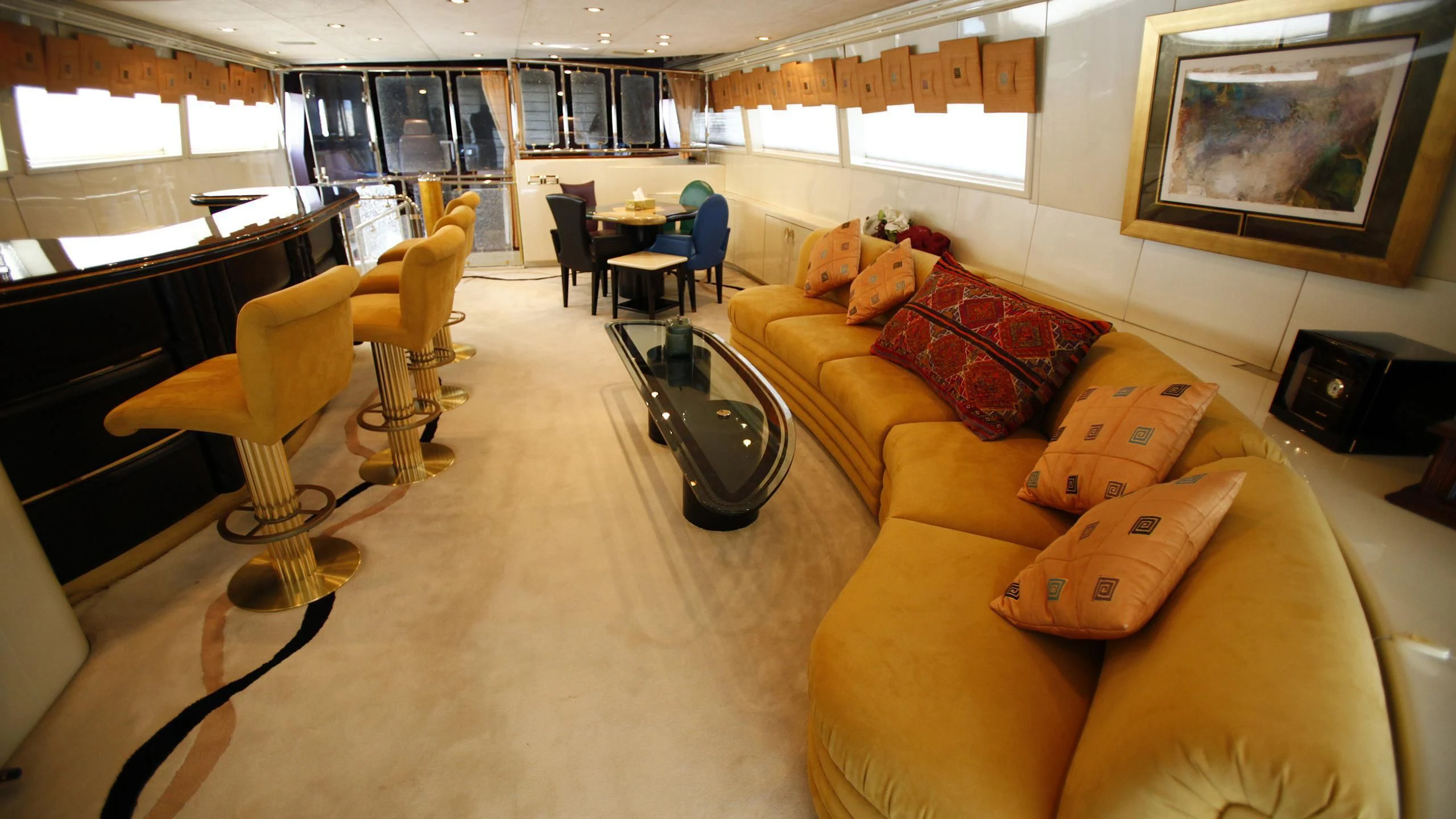 a living room with a couch and chairs aboard TAMTEEN Yacht for Sale